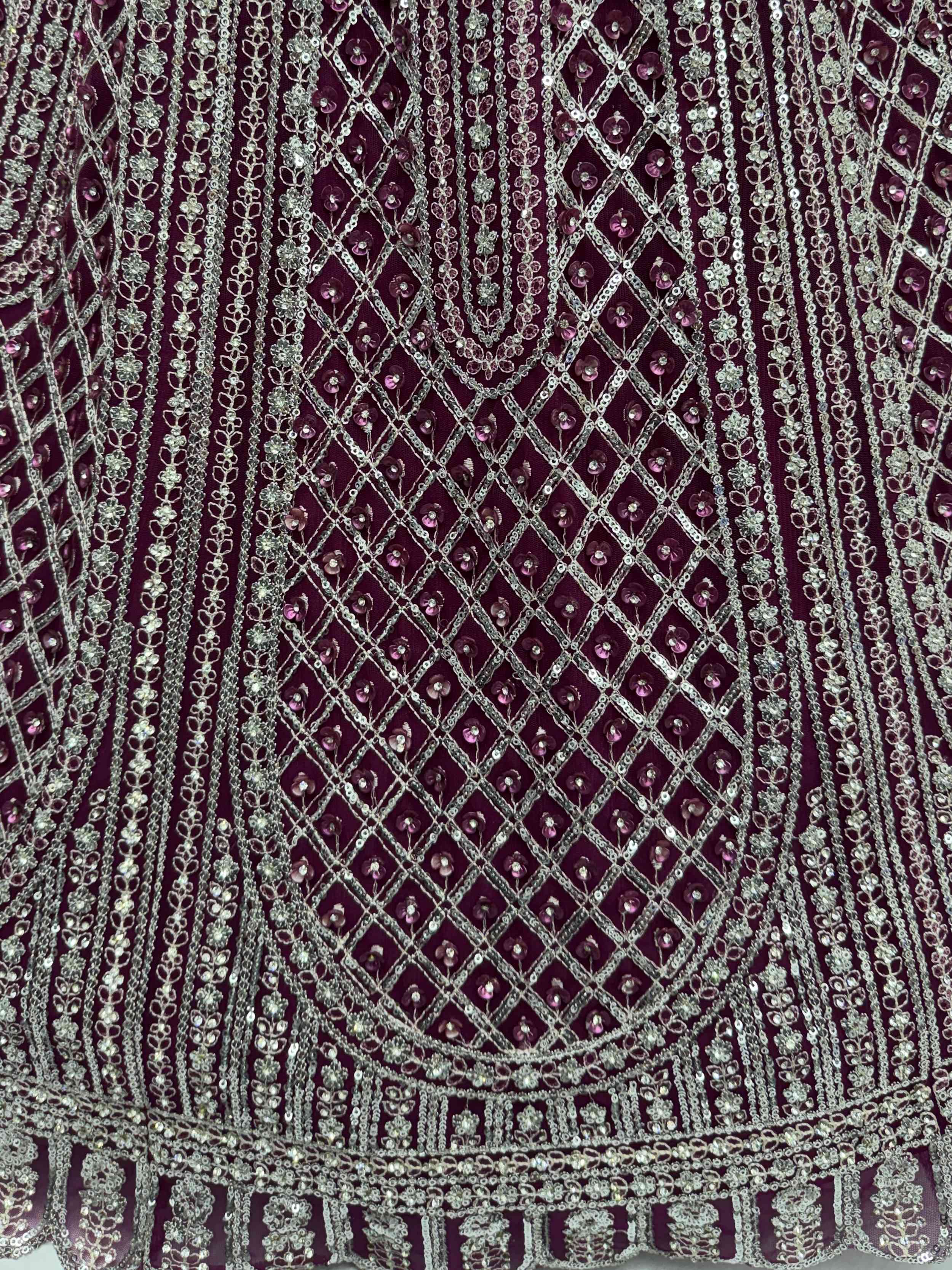 Gorgeous Wine Sequins Embroidered Net Reception Wear Lehenga Choli 