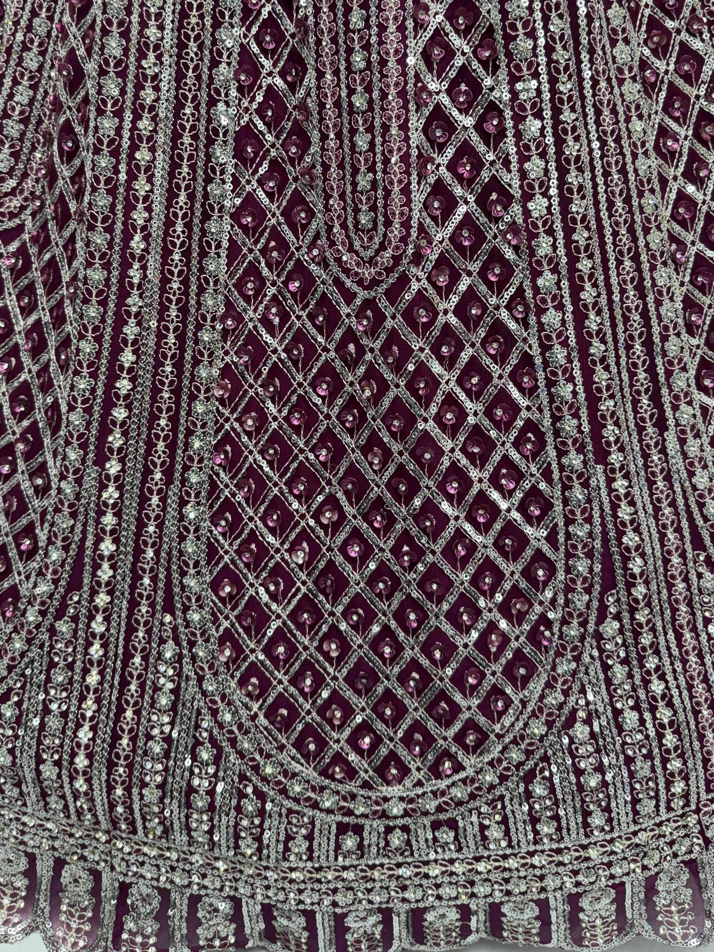 Gorgeous Wine Sequins Embroidered Net Reception Wear Lehenga Choli 