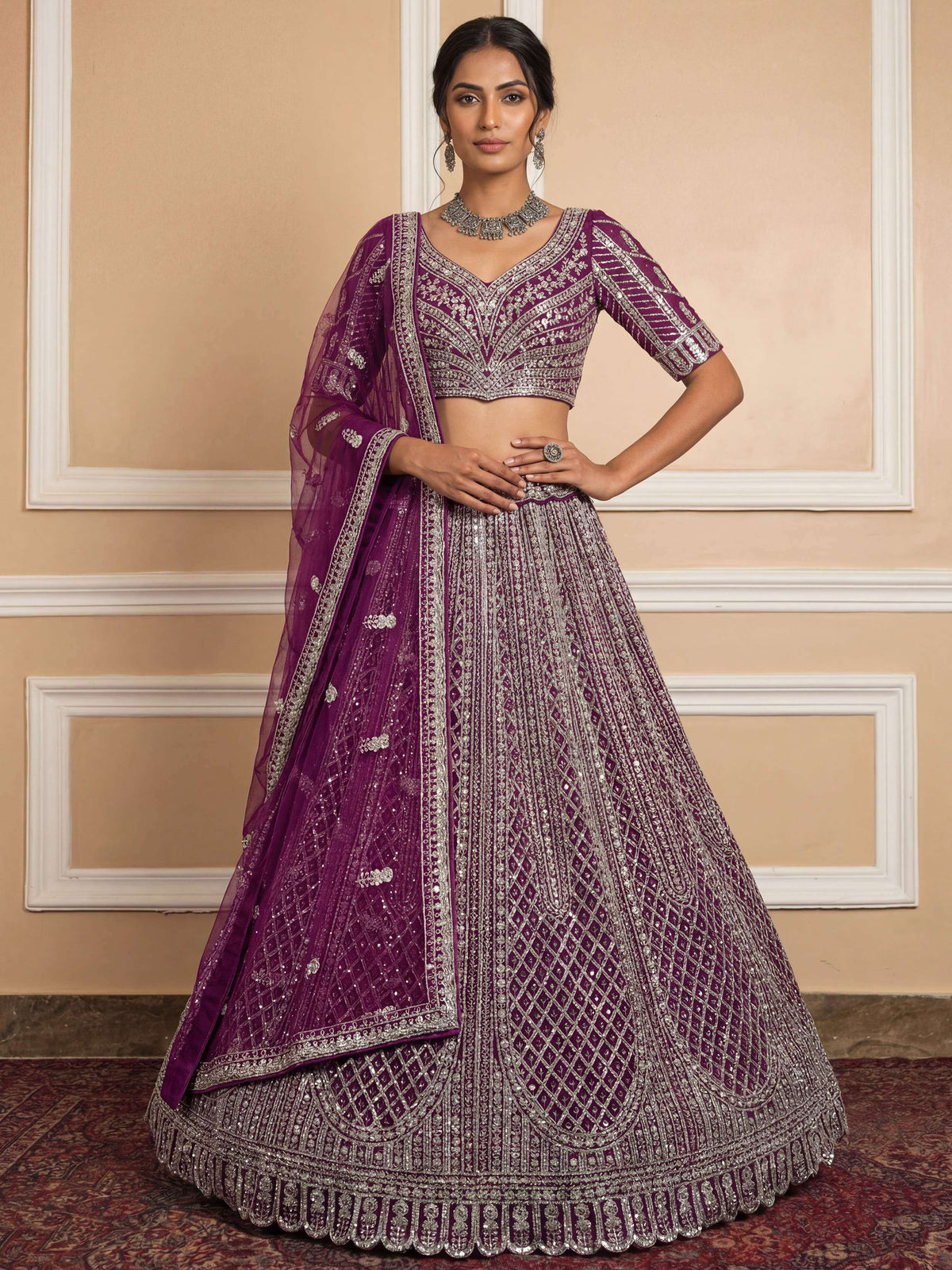 Gorgeous Wine Sequins Embroidered Net Reception Wear Lehenga Choli 