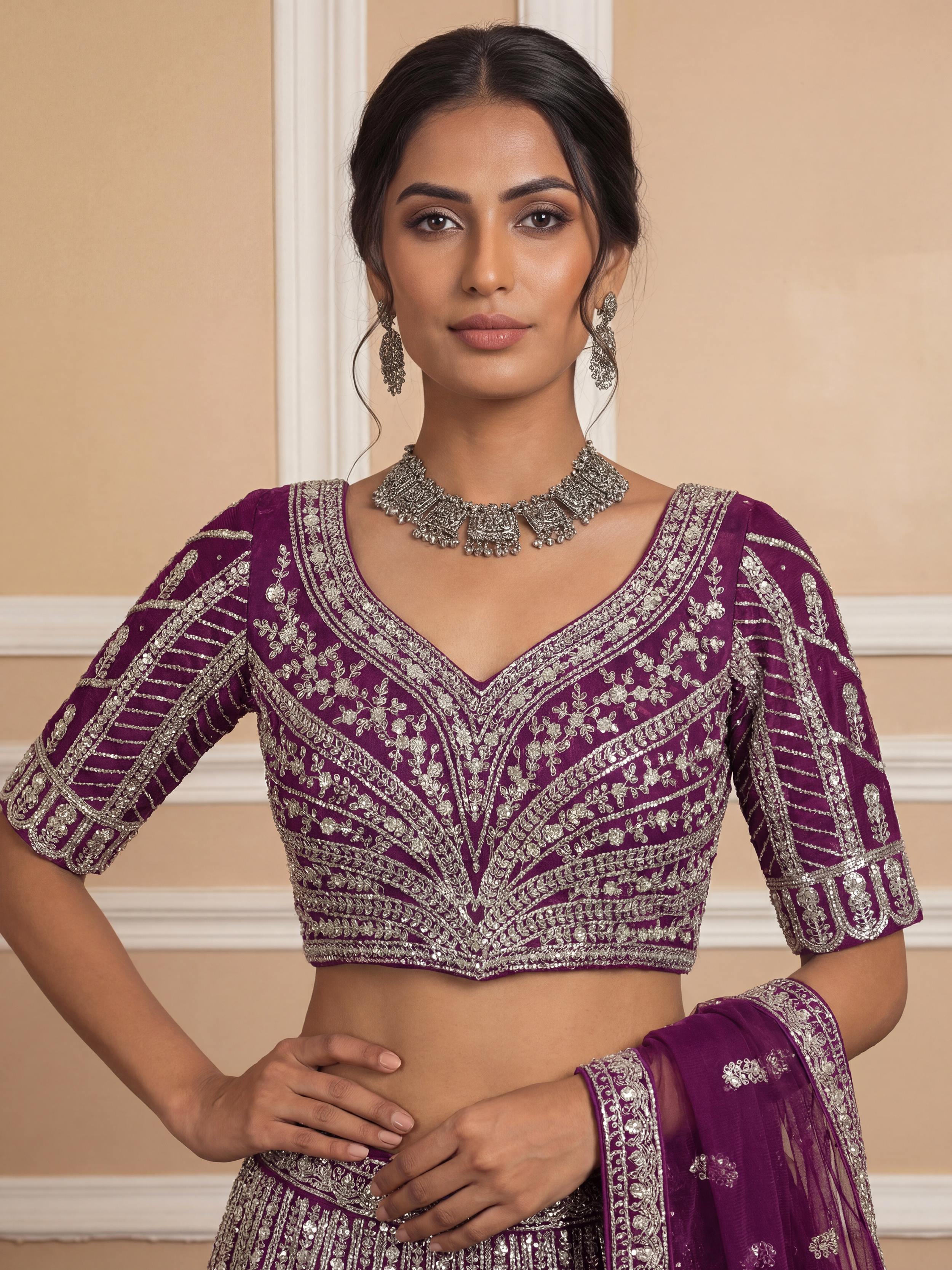 Gorgeous Wine Sequins Embroidered Net Reception Wear Lehenga Choli 