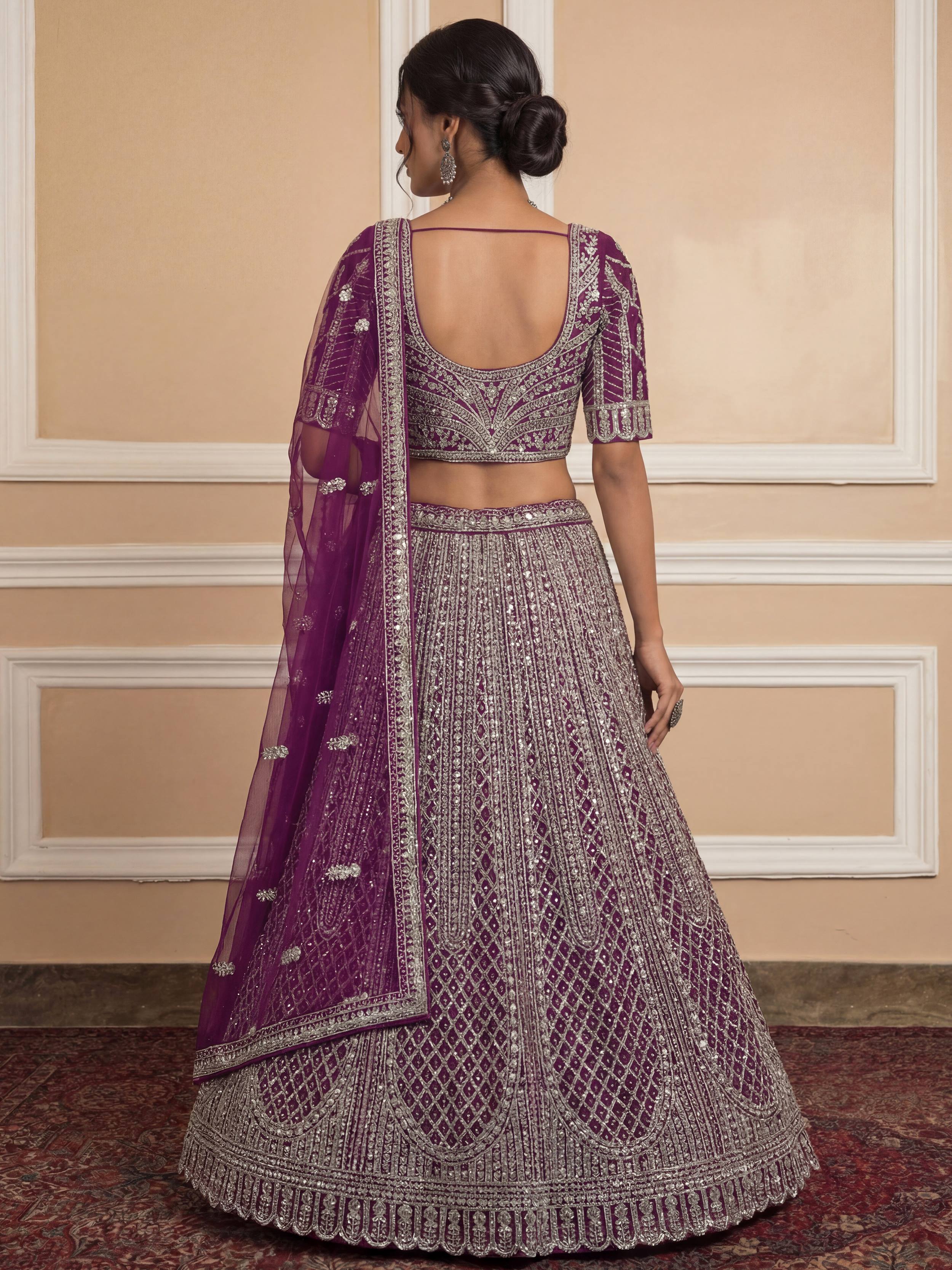 Gorgeous Wine Sequins Embroidered Net Reception Wear Lehenga Choli 