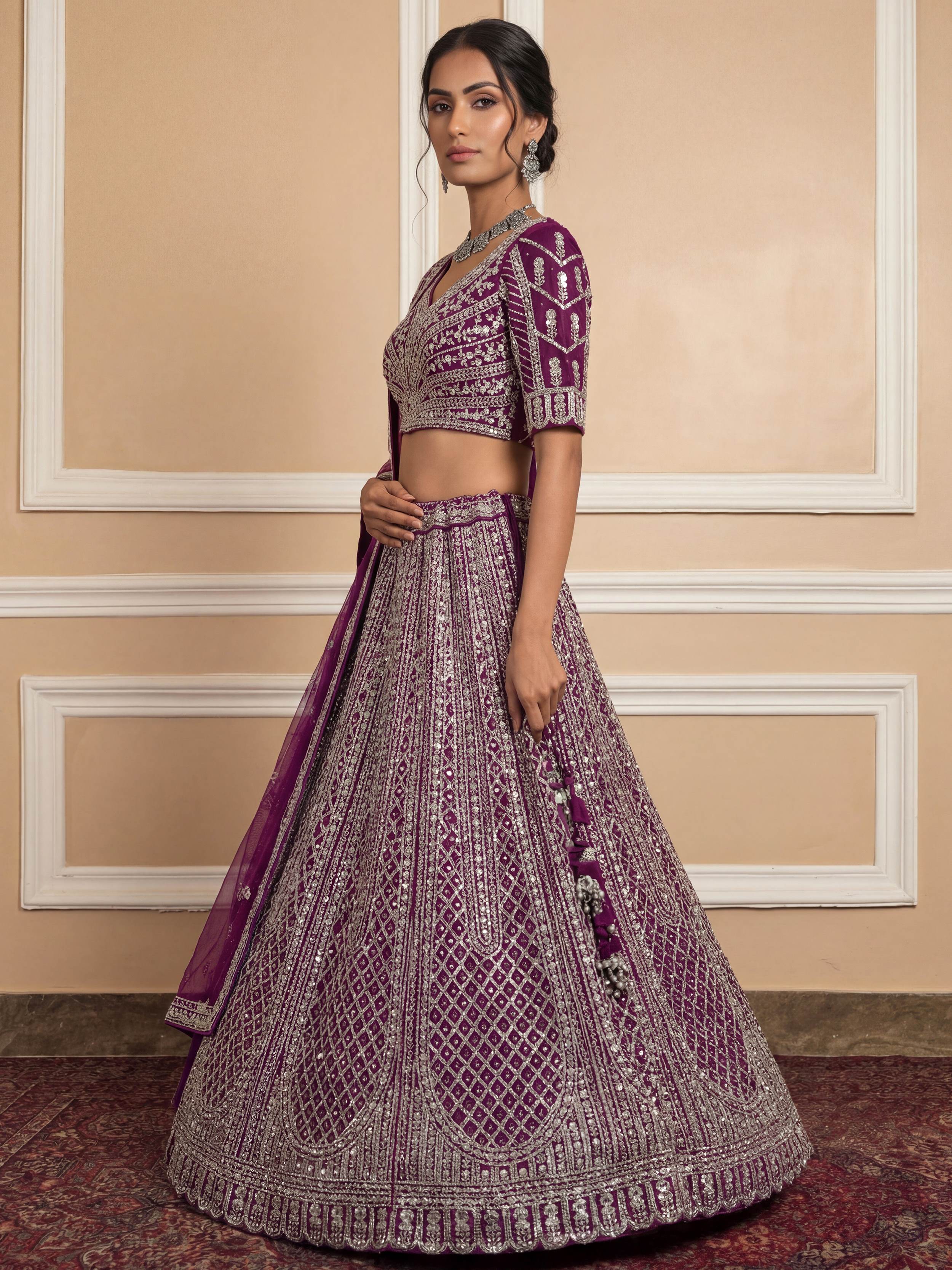 Gorgeous Wine Sequins Embroidered Net Reception Wear Lehenga Choli 