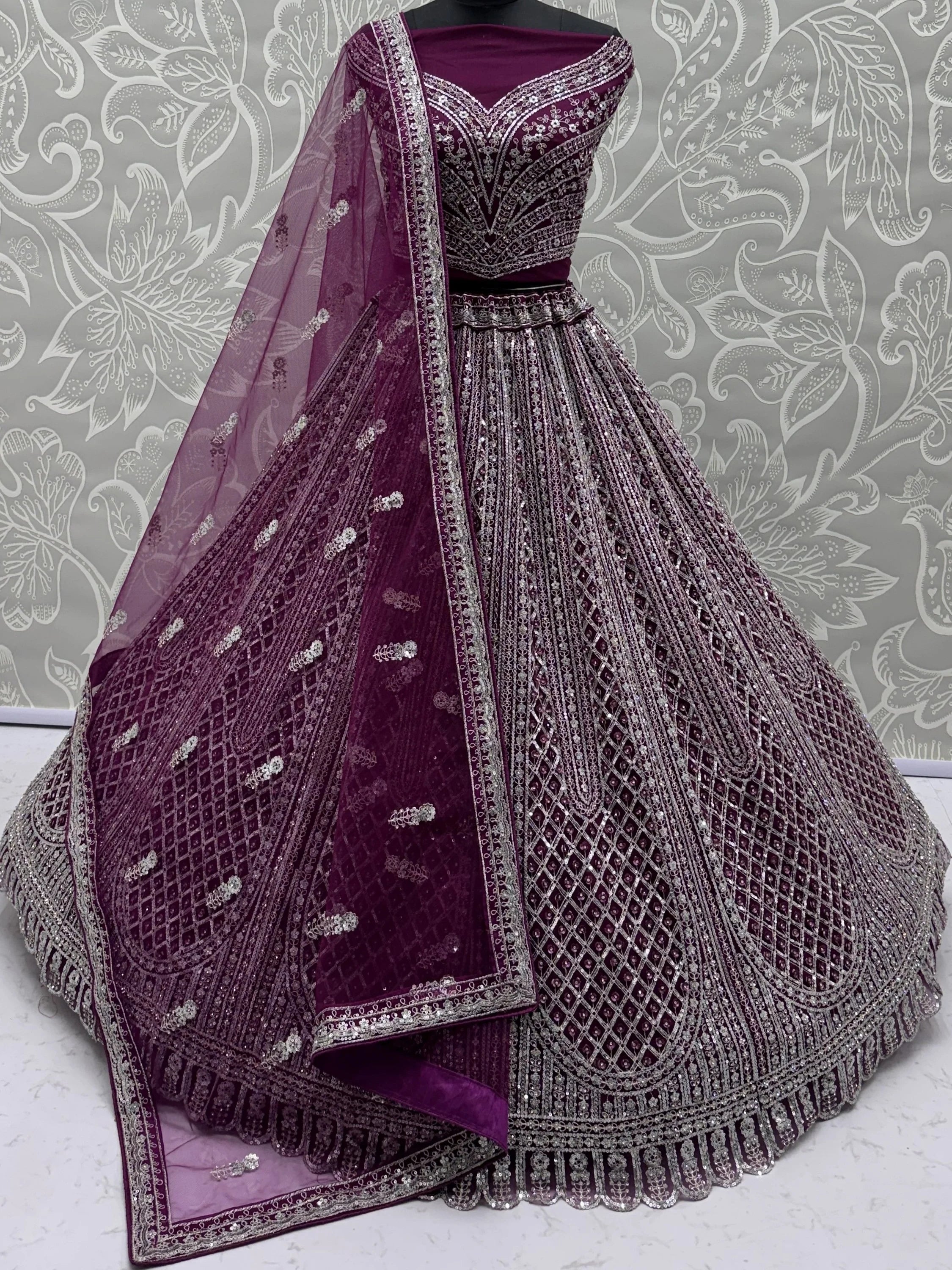 Gorgeous Wine Sequins Embroidered Net Reception Wear Lehenga Choli