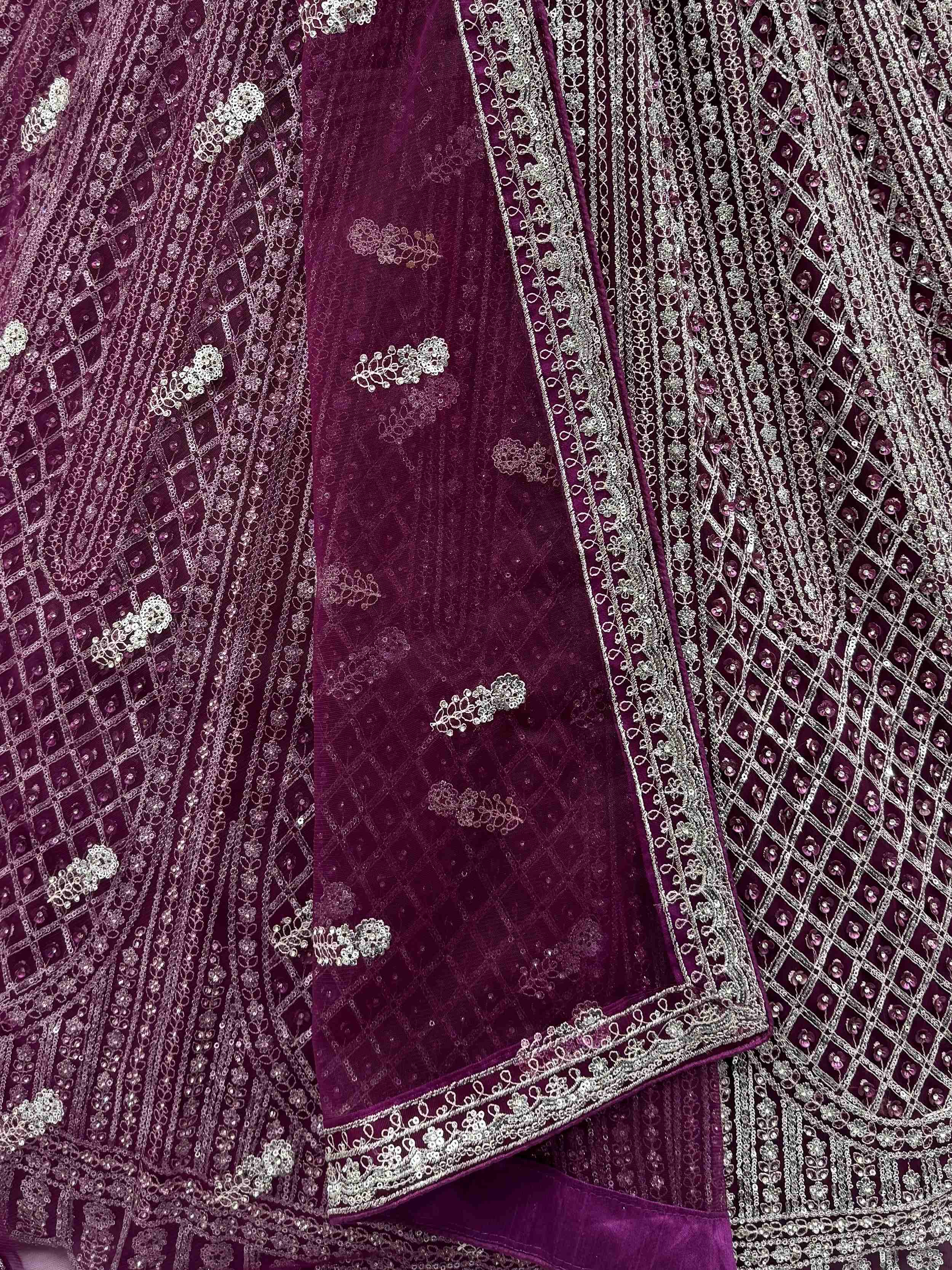 Gorgeous Wine Sequins Embroidered Net Reception Wear Lehenga Choli 