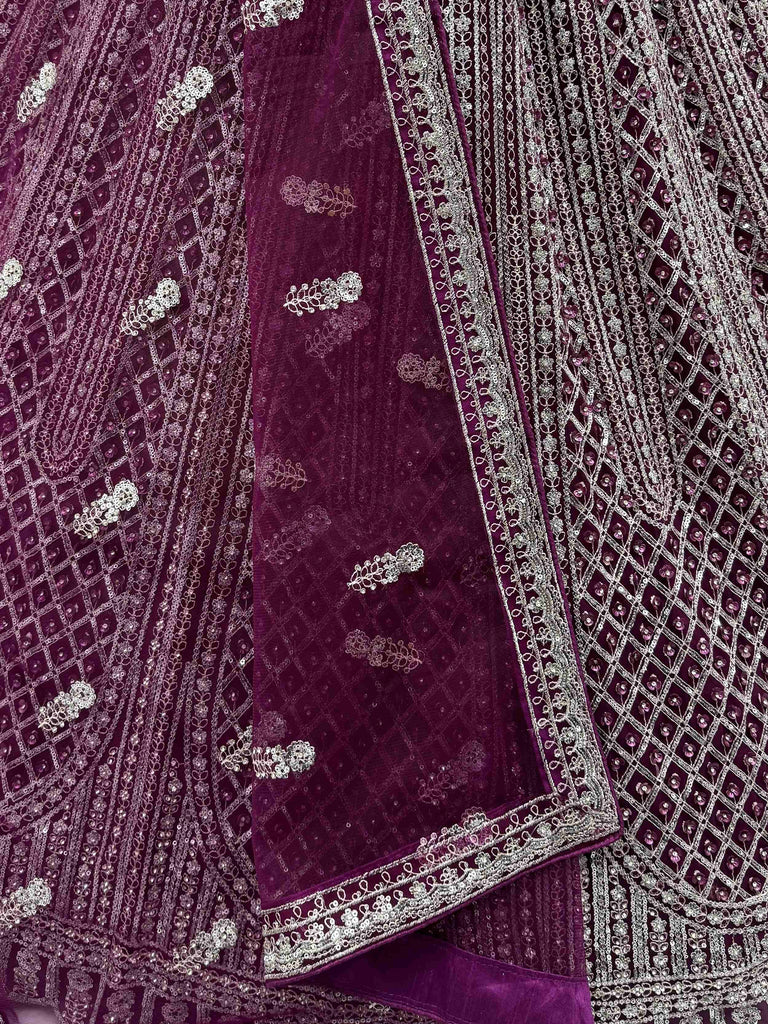 Gorgeous Wine Sequins Embroidered Net Reception Wear Lehenga Choli 