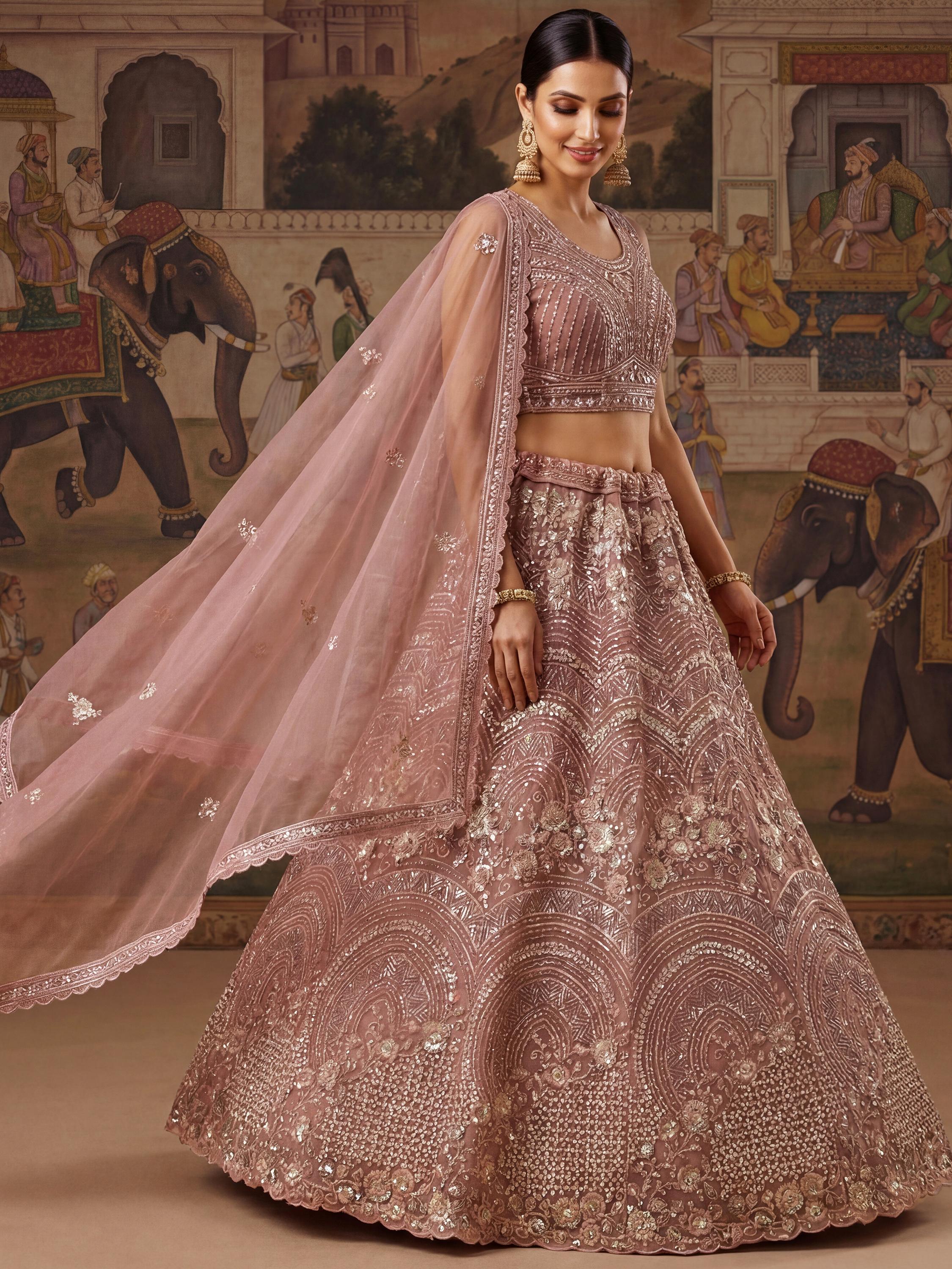 Beautiful Pink Embroidered Net Reception Wear Lehenga Choli