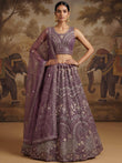 Charming Purple Embroidered Net Engagement Wear Lehenga Choli