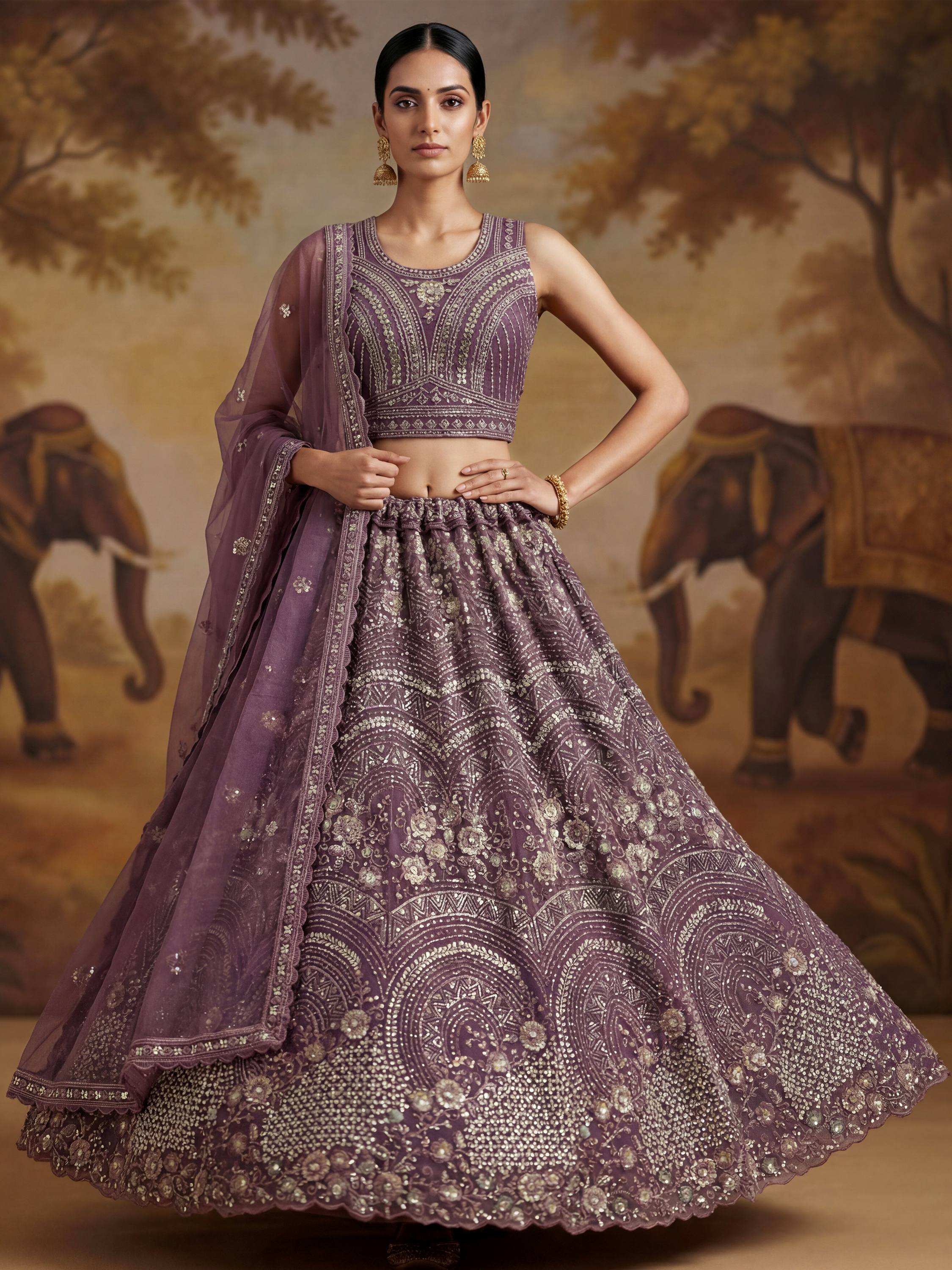 Charming Purple Embroidered Net Engagement Wear Lehenga Choli