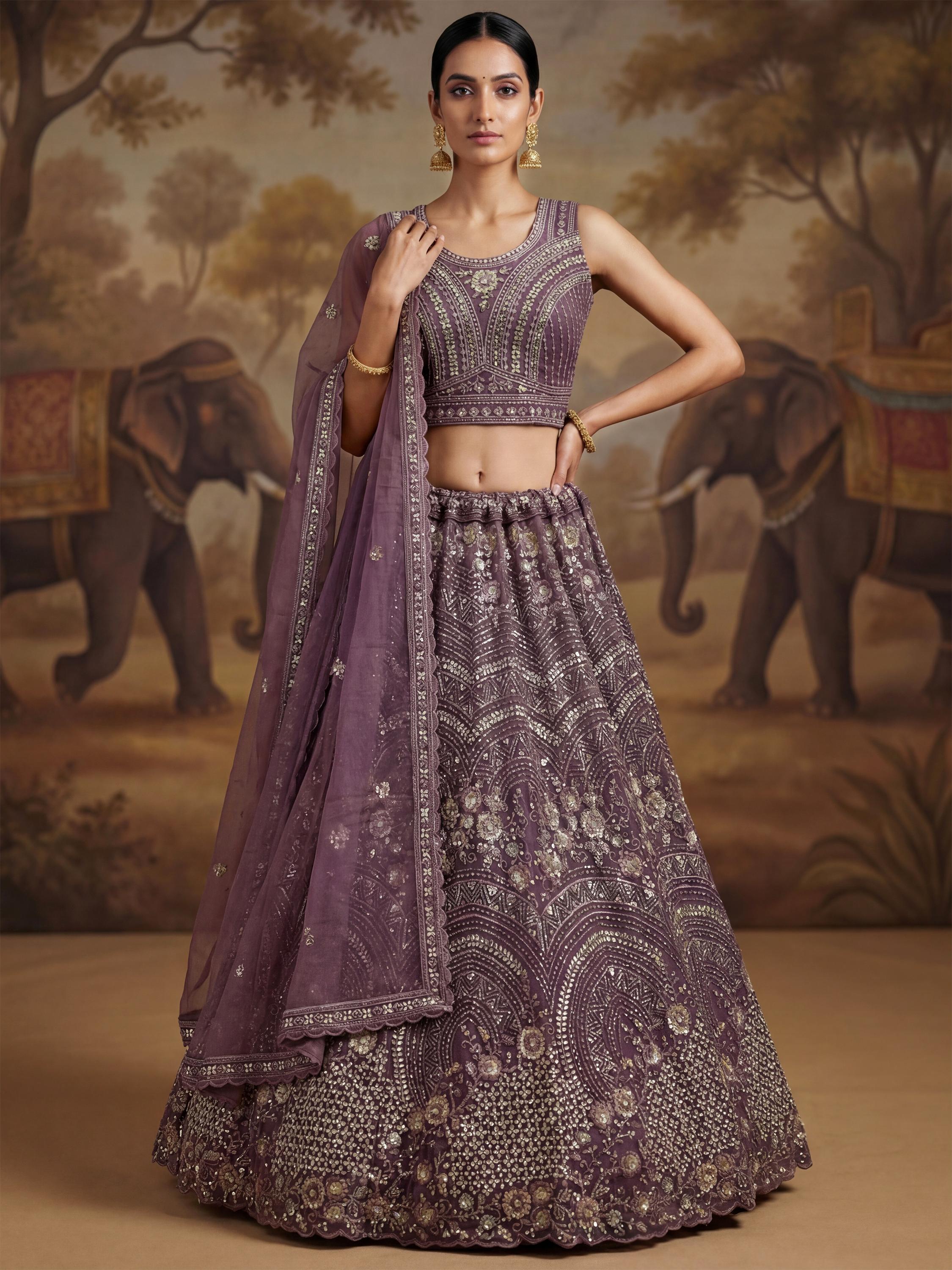Charming Purple Embroidered Net Engagement Wear Lehenga Choli