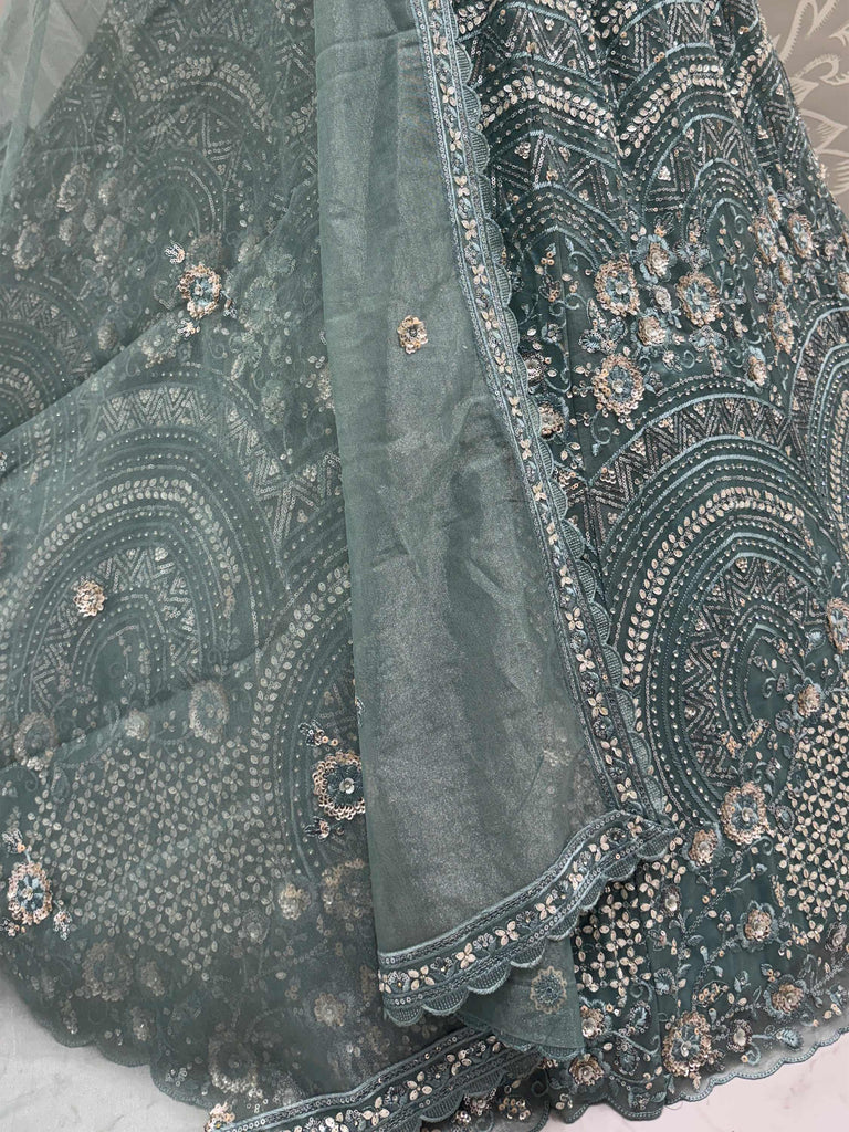 Dazzling Green Embroidered Net Wedding Wear Lehenga Choli