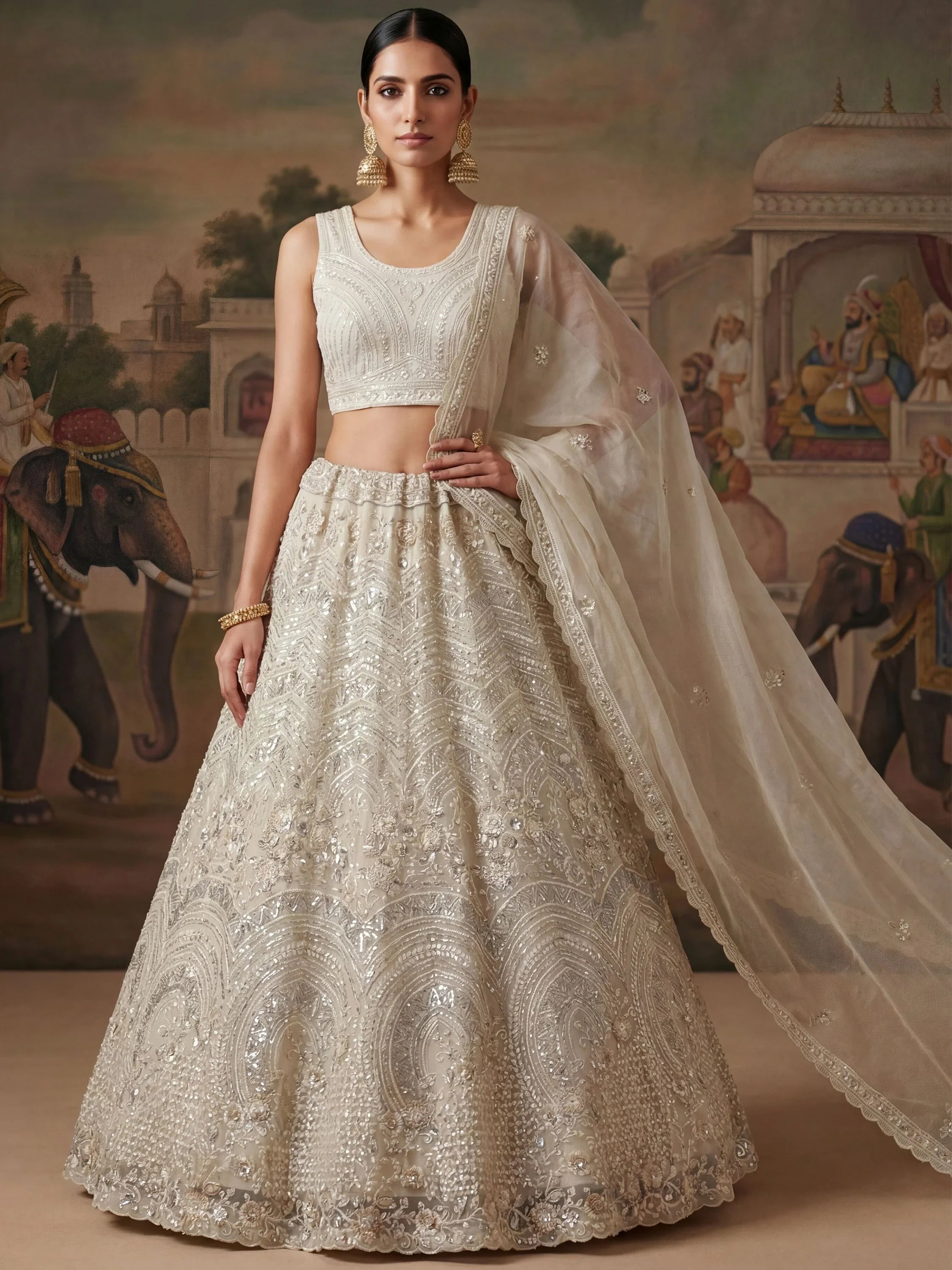 Stunning White Embroidered Net Sangeet Wear Lehenga Choli