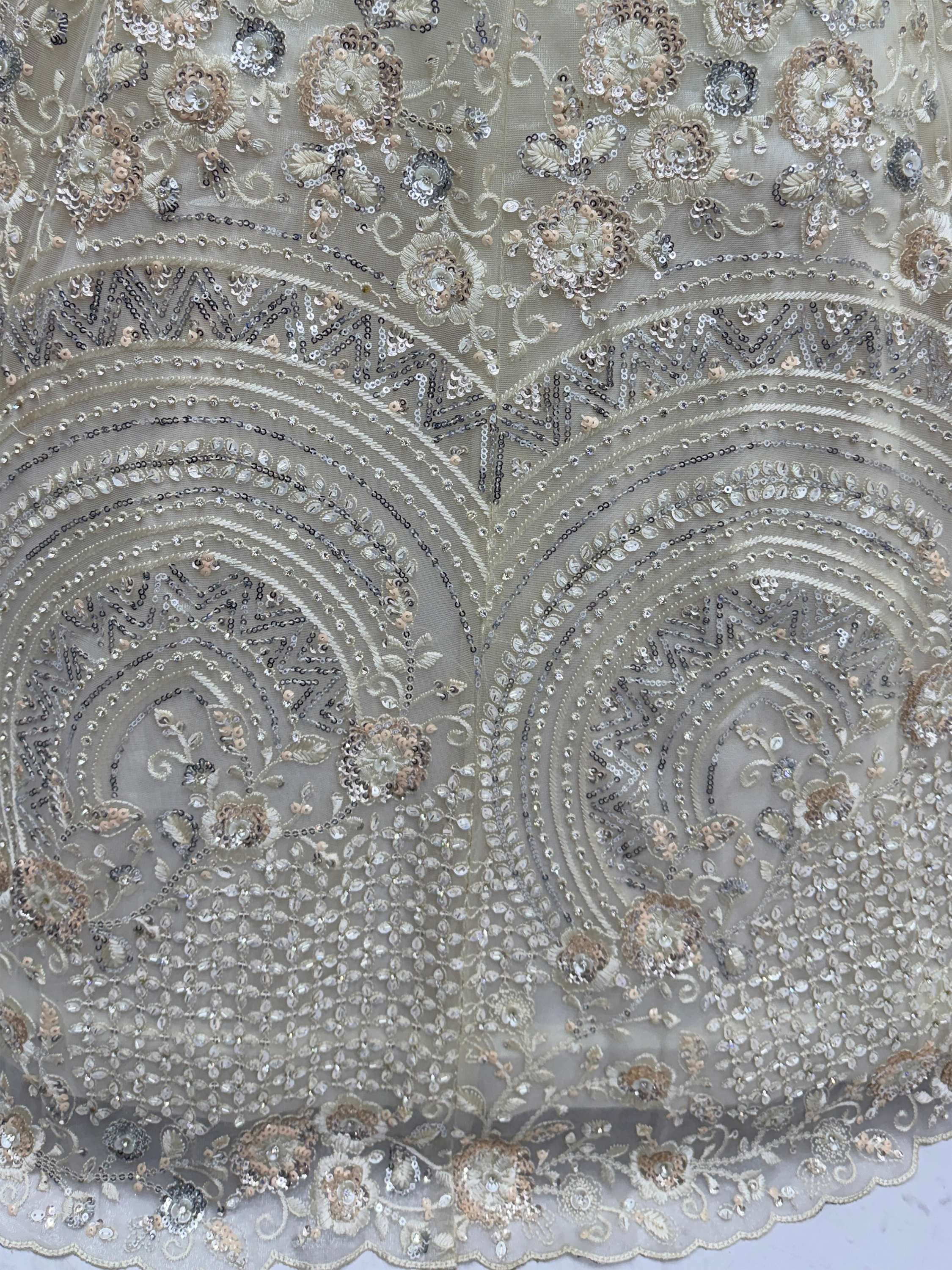 Stunning White Embroidered Net Sangeet Wear Lehenga Choli