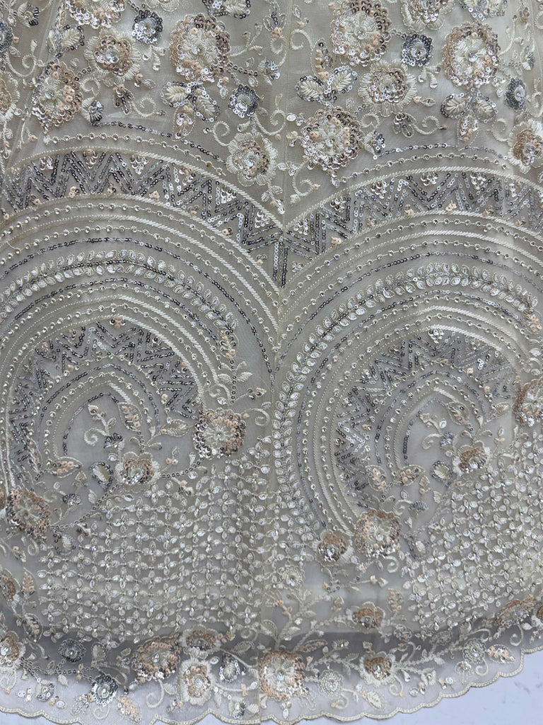 Stunning White Embroidered Net Sangeet Wear Lehenga Choli