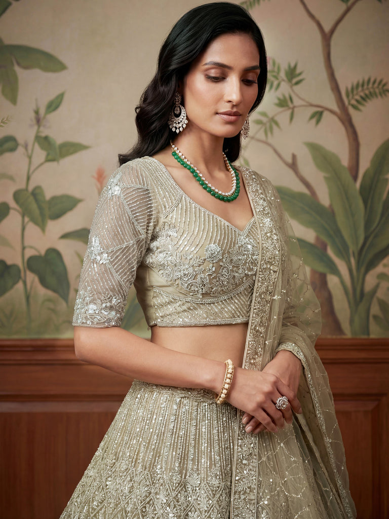Classic Beige Embroidered Net Engagement Wear Lehenga Choli