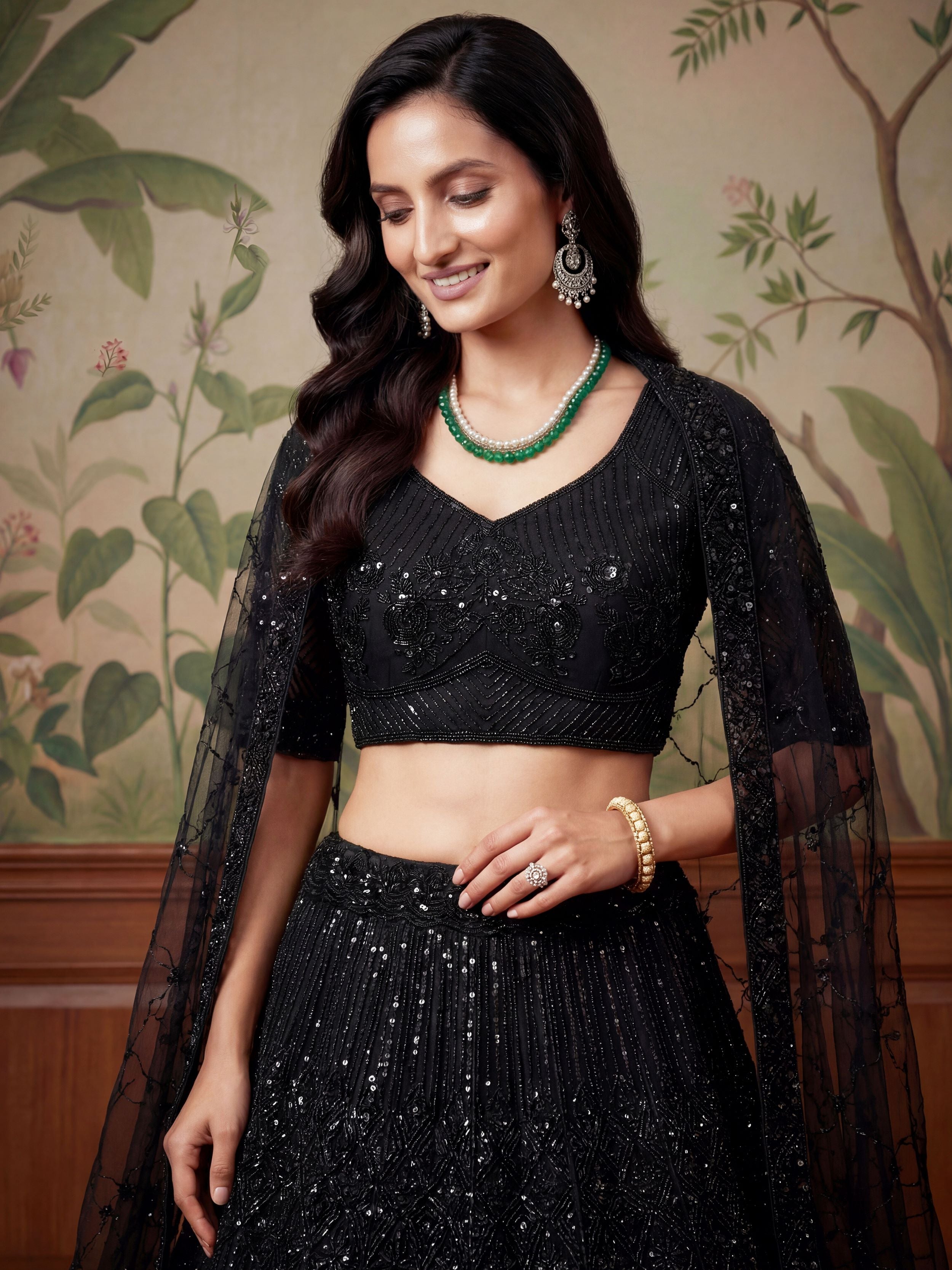 Alluring Black Sequins Embroidered Net Reception Wear Lehenga Choli