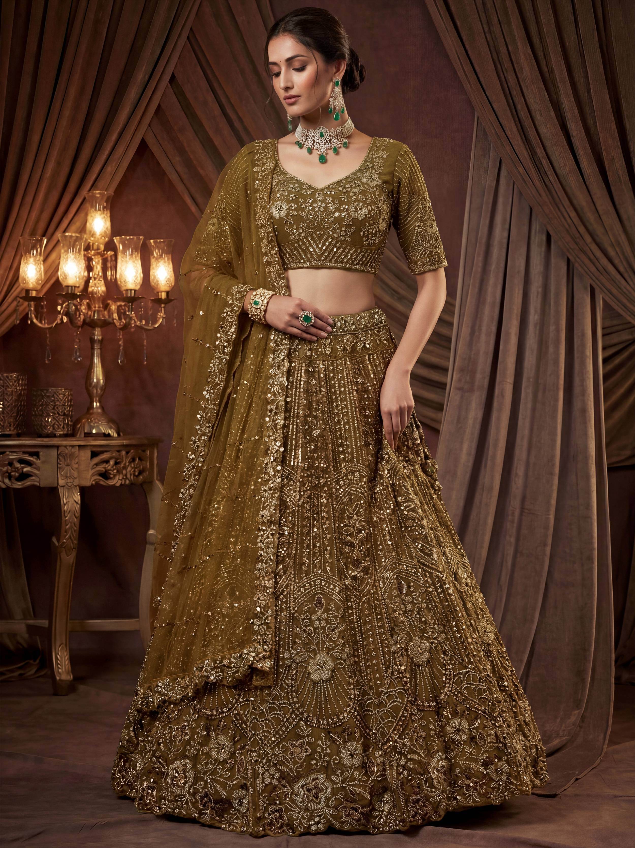 Captivating Green Embroidered Net Wedding Wear Lehenga Choli