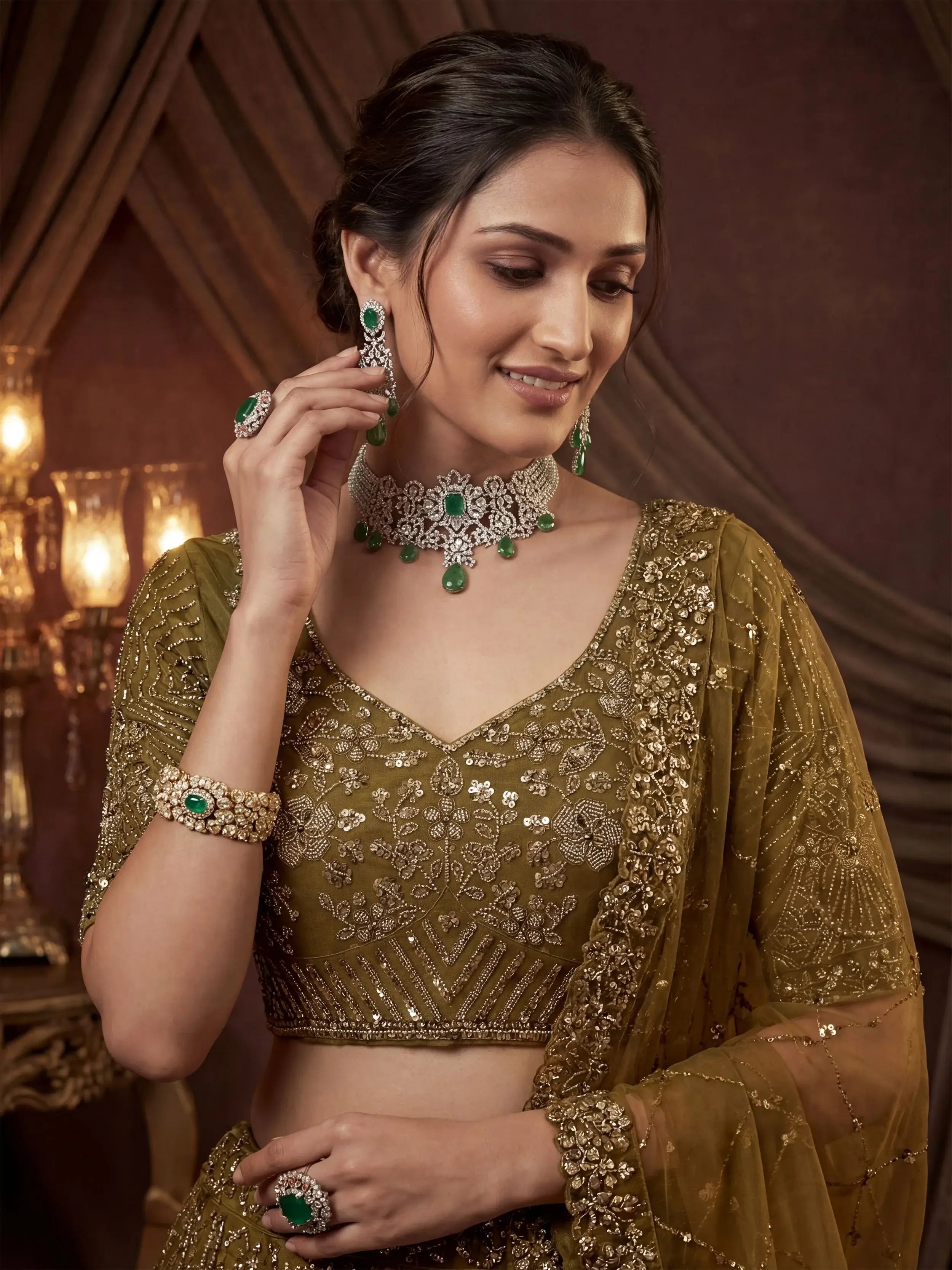 Captivating Green Embroidered Net Wedding Wear Lehenga Choli