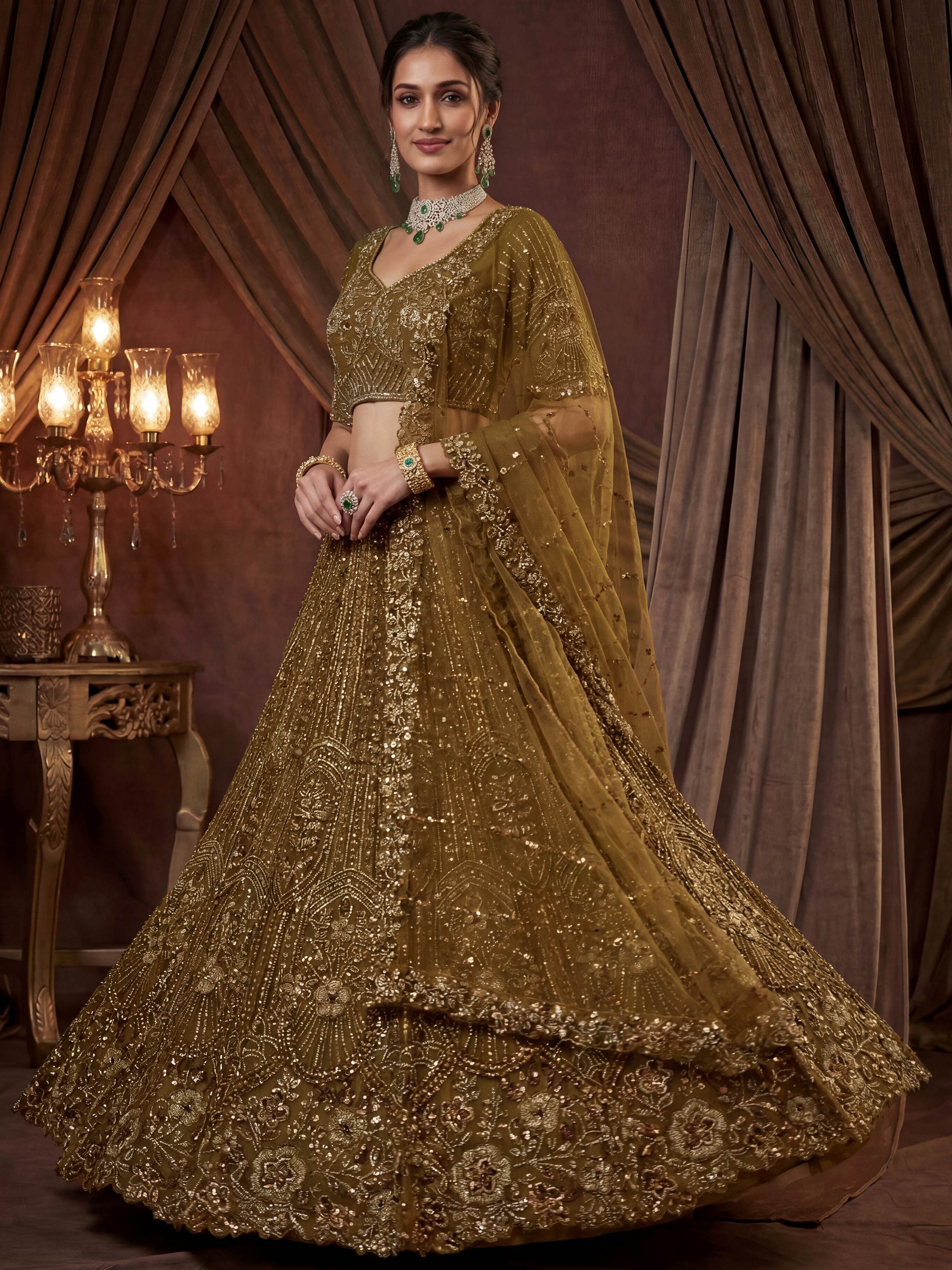 Captivating Green Embroidered Net Wedding Wear Lehenga Choli