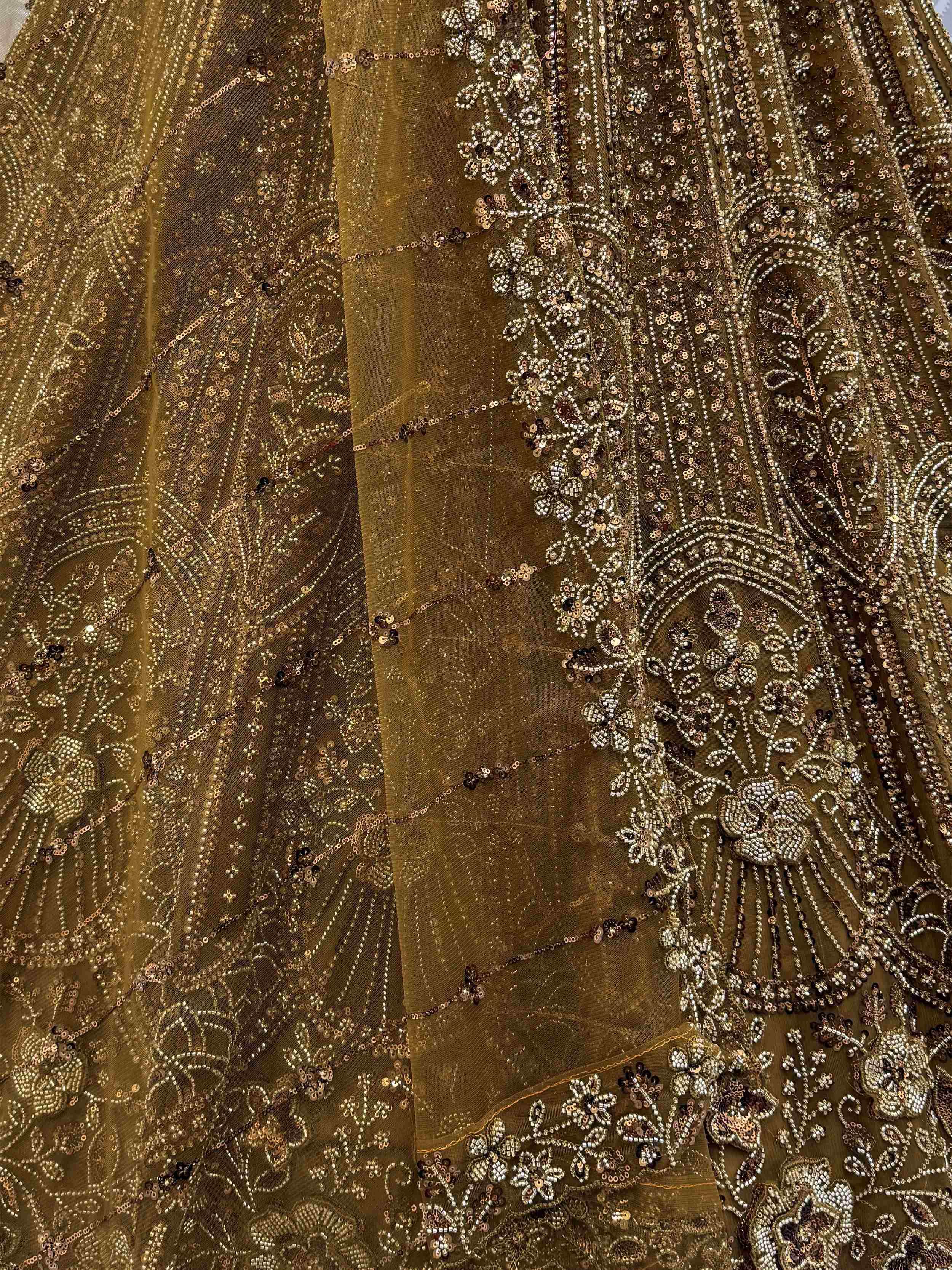 Captivating Green Embroidered Net Wedding Wear Lehenga Choli