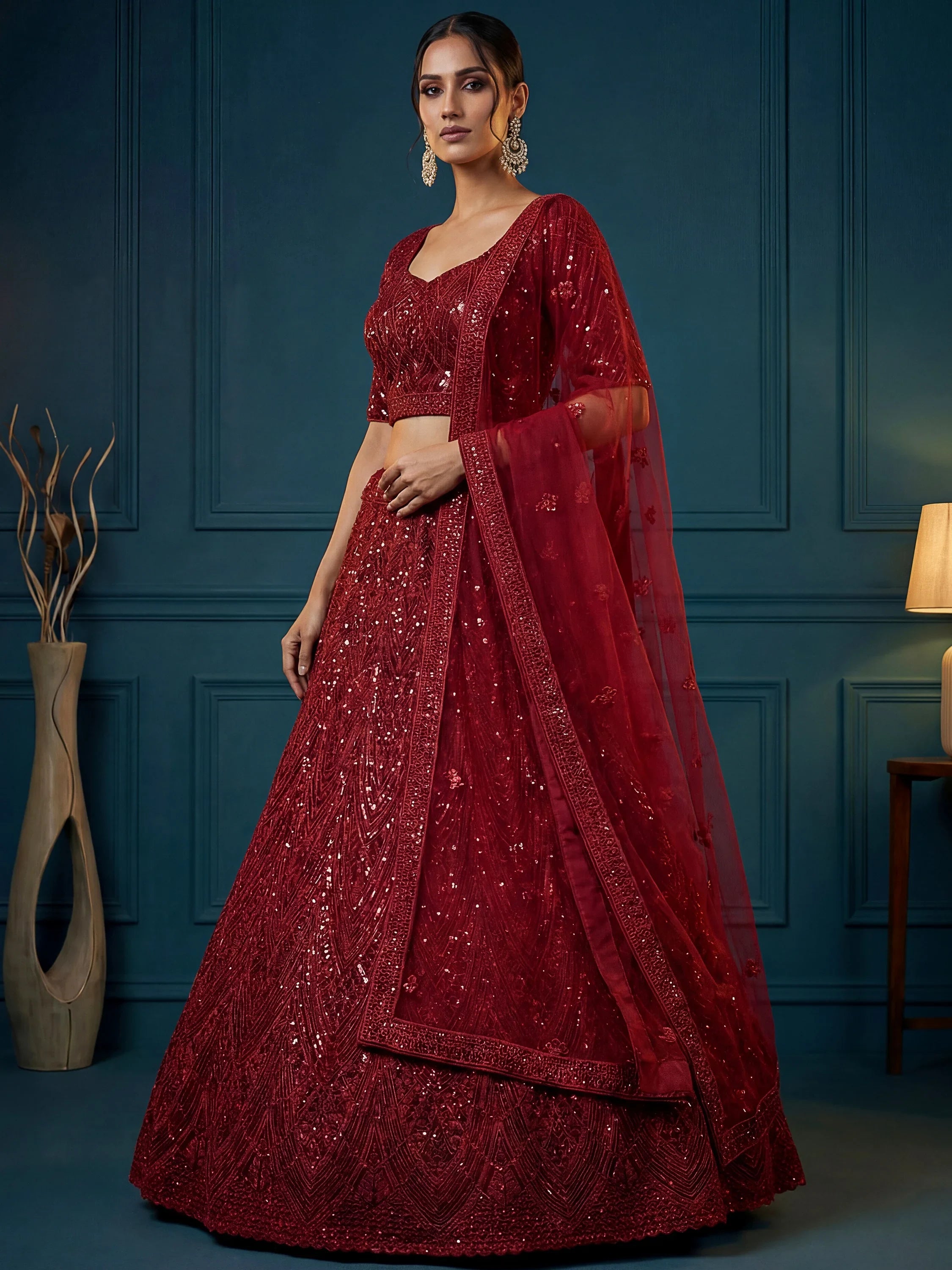 Attractive Maroon Sequins Net Engagement Wear Lehenga Choli