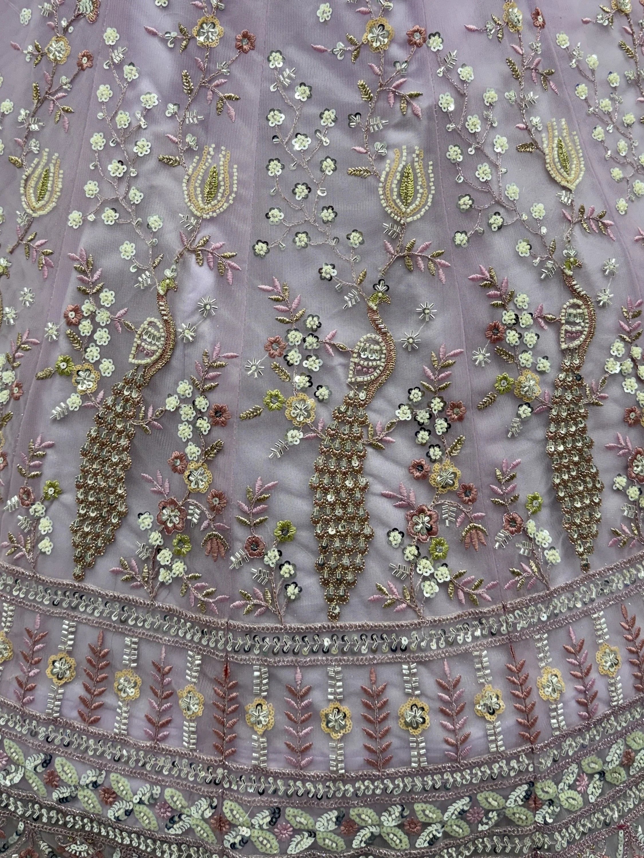 Gorgeous Lavender Embroidered Net Engagement Wear Lehenga Choli