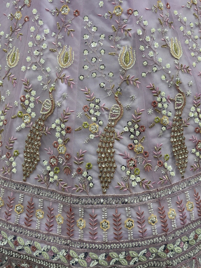 Gorgeous Lavender Embroidered Net Engagement Wear Lehenga Choli