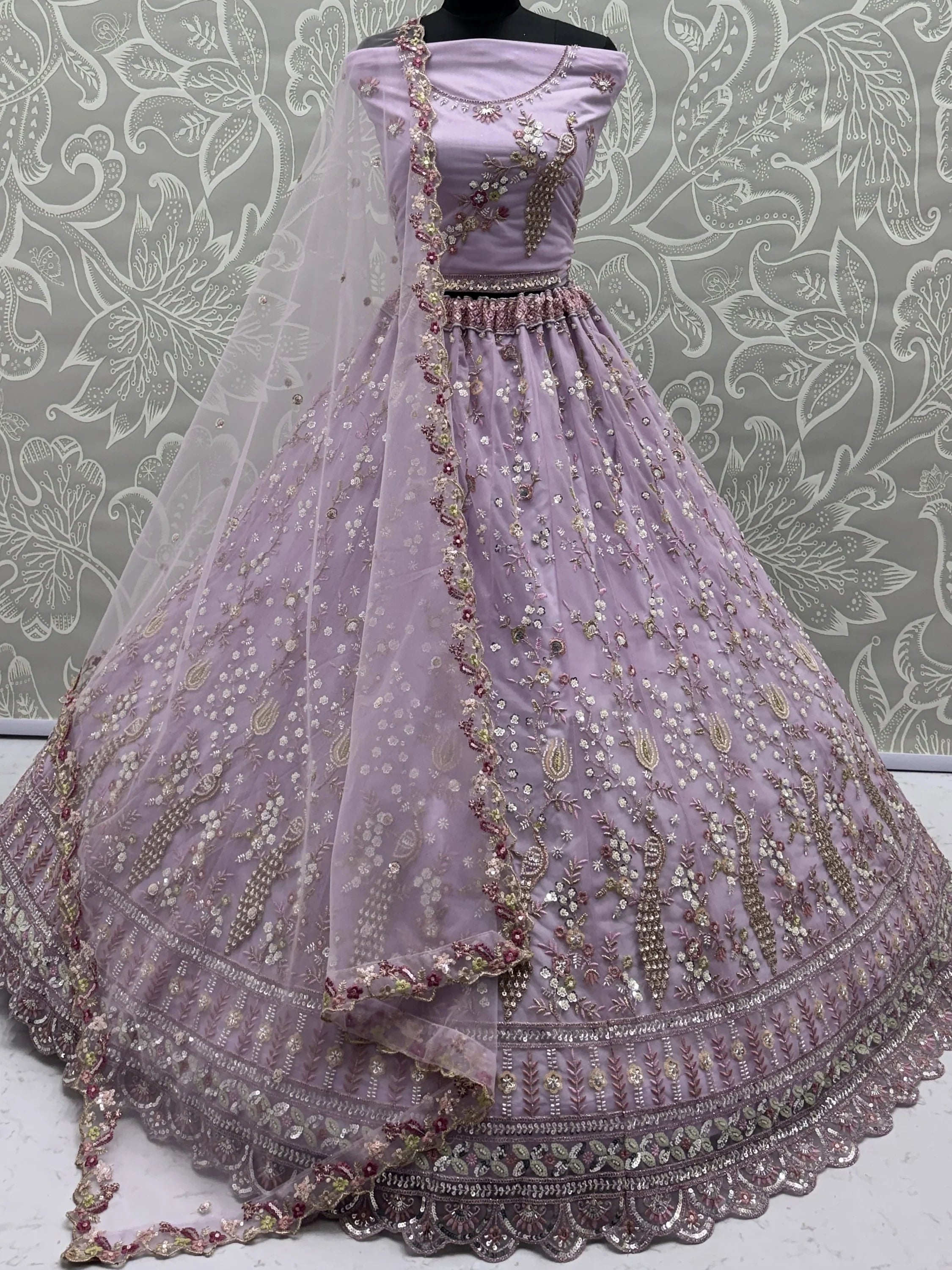 Gorgeous Lavender Embroidered Net Engagement Wear Lehenga Choli