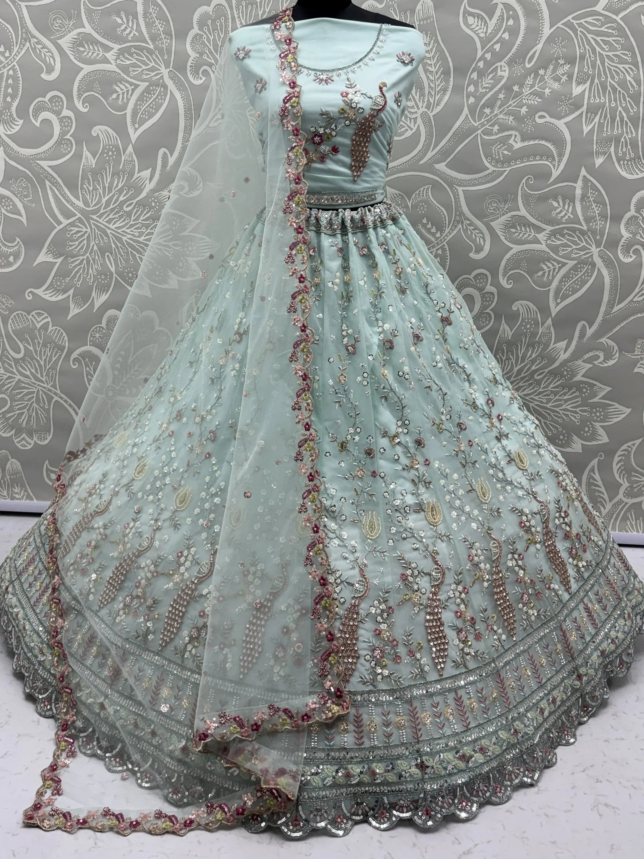 Graceful Sky Blue Embroidered Net Party Wear Lehenga Choli