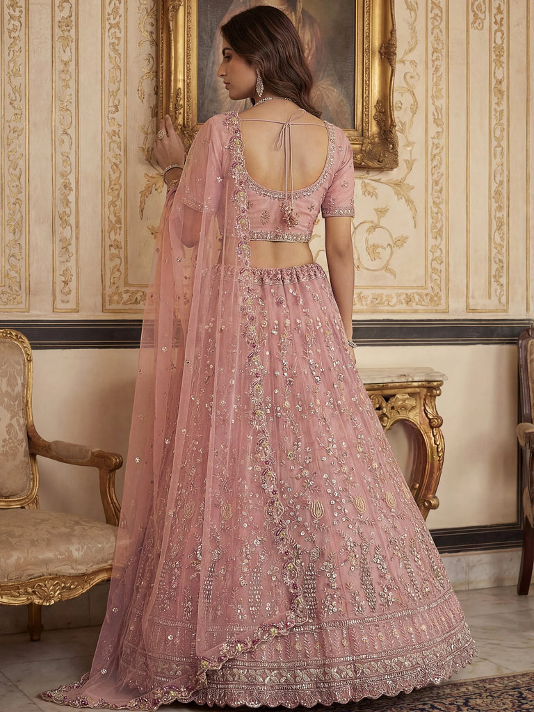 Captivating Peach Embroidered Net Wedding Wear Lehenga Choli