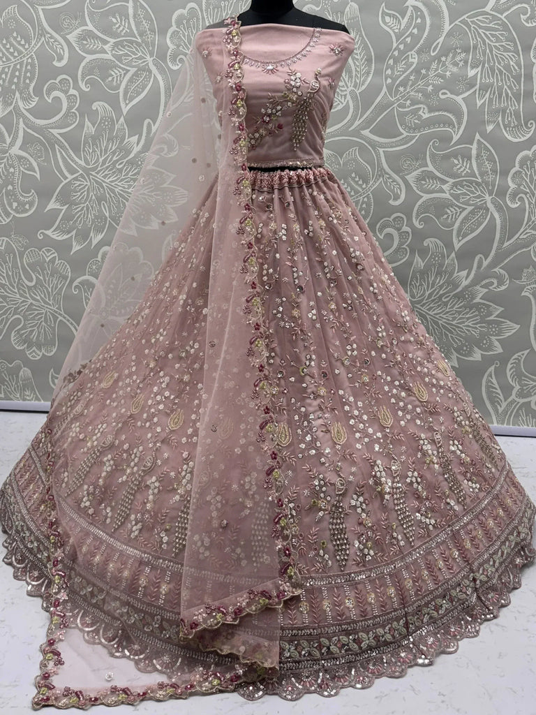 Captivating Peach Embroidered Net Wedding Wear Lehenga Choli