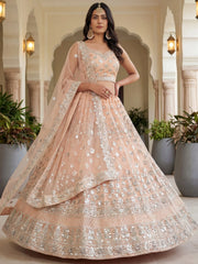 Dazzling Peach Sequins Net Engagement Wear Lehenga Choli