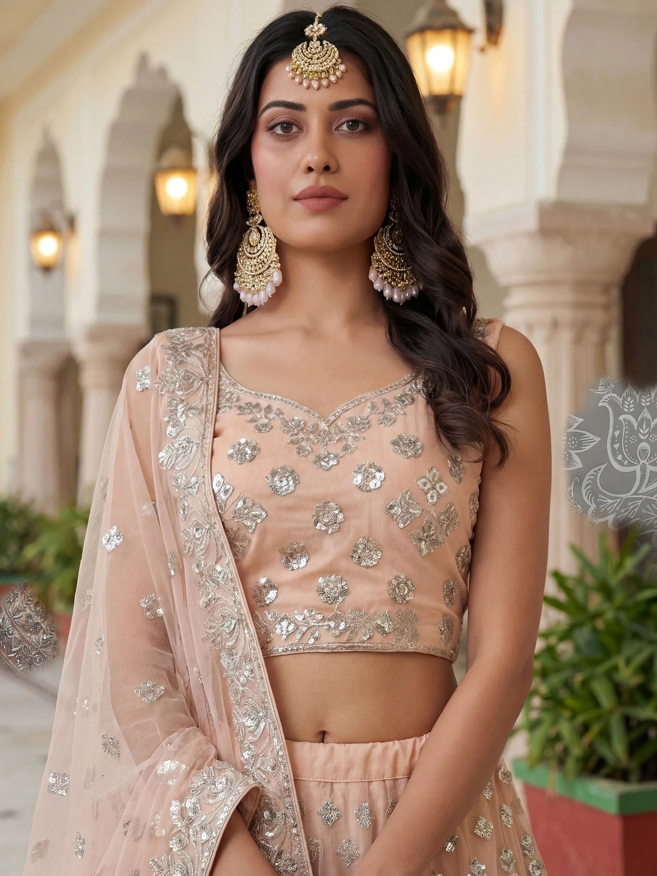 Dazzling Peach Sequins Net Engagement Wear Lehenga Choli