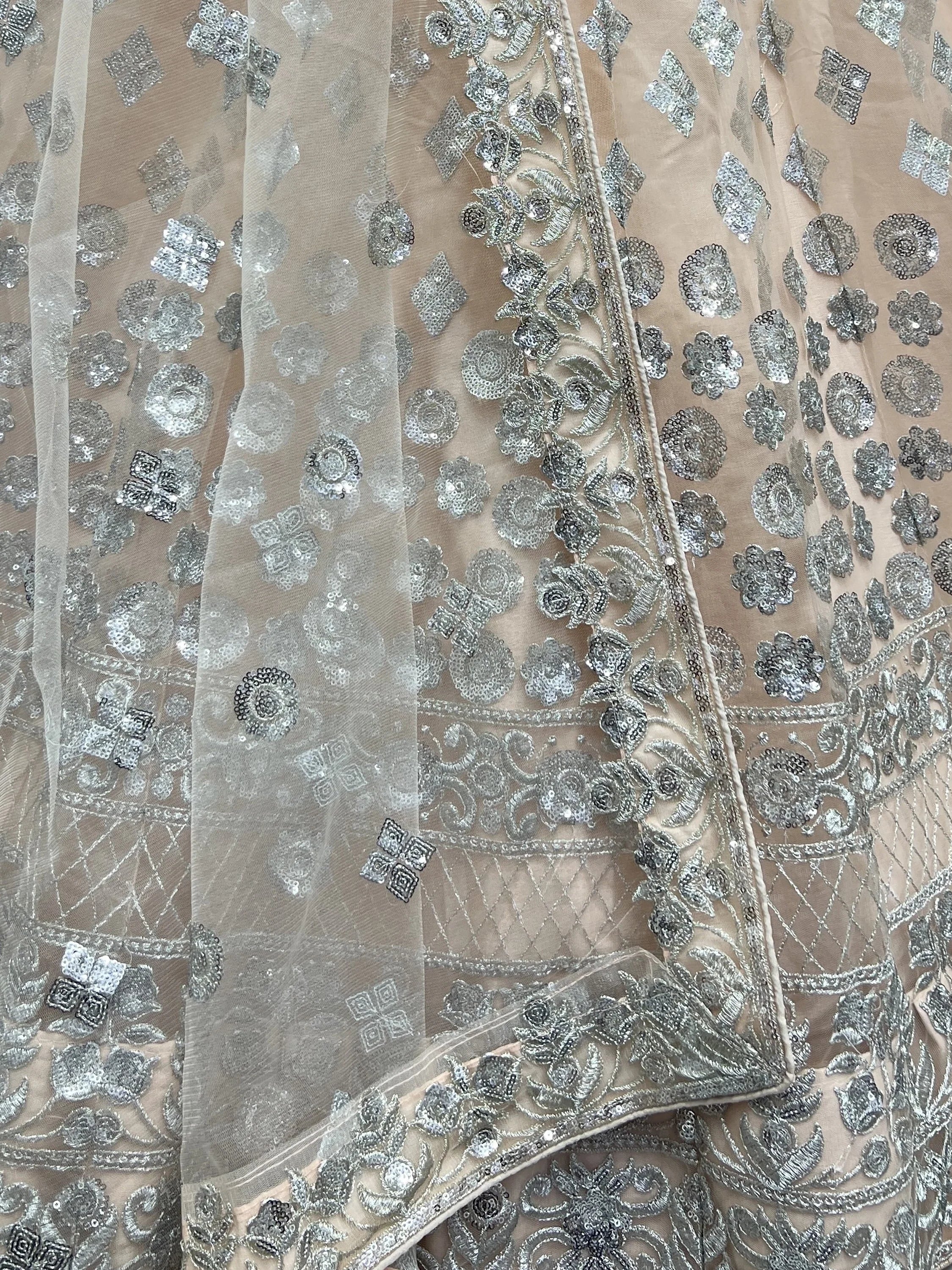 Dazzling Peach Sequins Net Engagement Wear Lehenga Choli