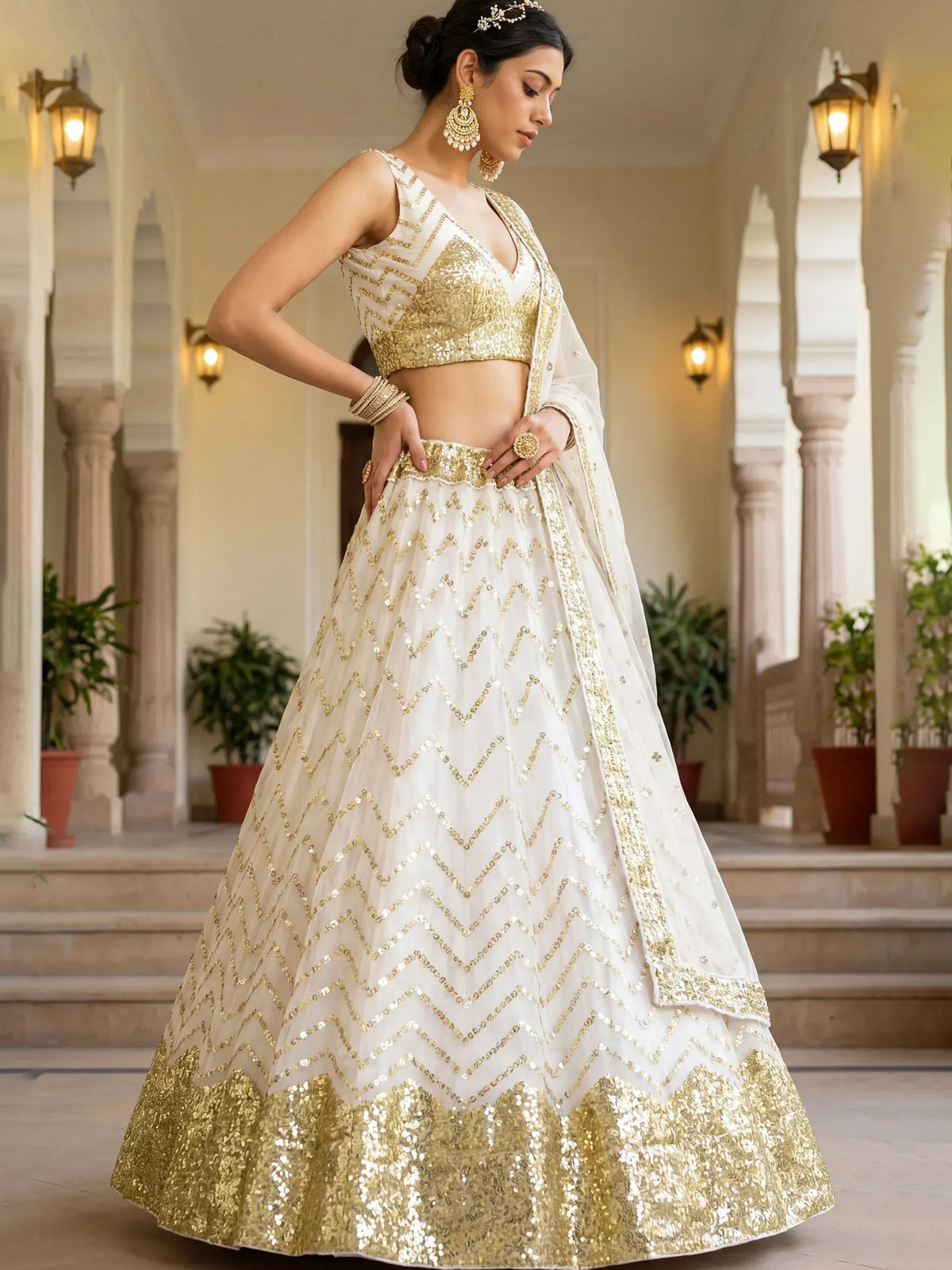 White and gold sequin lehenga choli with chevron pattern, perfect for Indian weddings and festive occasions