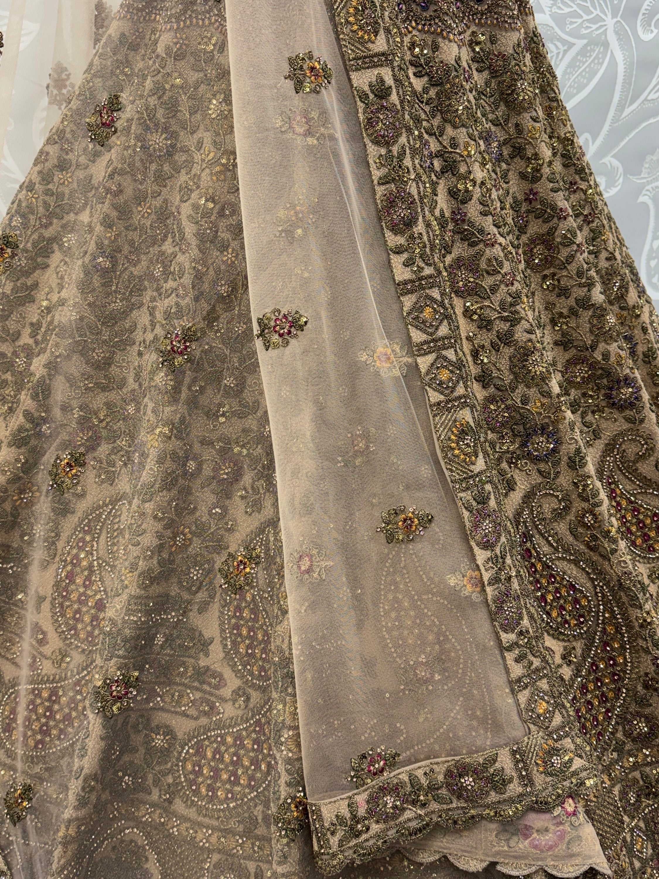 Grand Beige Zari Embroidery Net Sangeet Wear Lehenga Choli With Dupatta