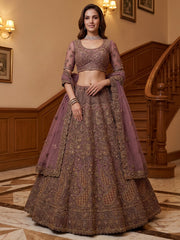 Luxurious Mauve Dori Work Net Reception Wear Lehenga With Blouse