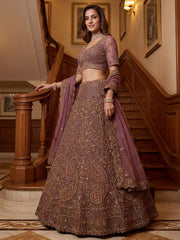 Luxurious Mauve Dori Work Net Reception Wear Lehenga With Blouse