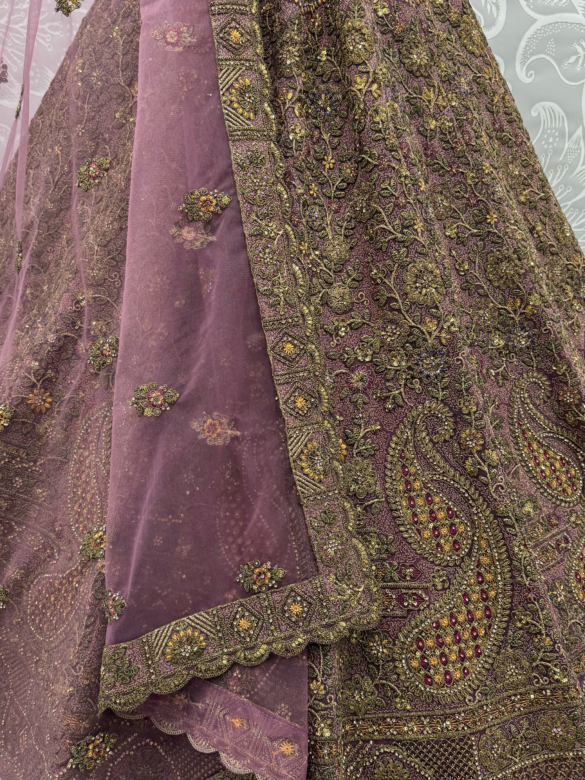 Luxurious Mauve Dori Work Net Reception Wear Lehenga With Blouse