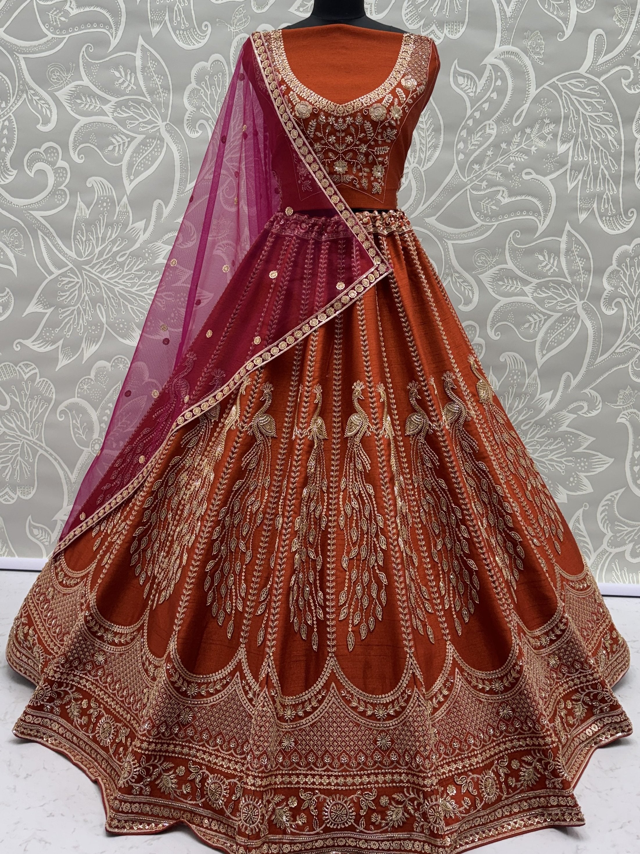 Stylish Rust Orange Hand Work Bridal Lehenga Choli With Double Dupatta