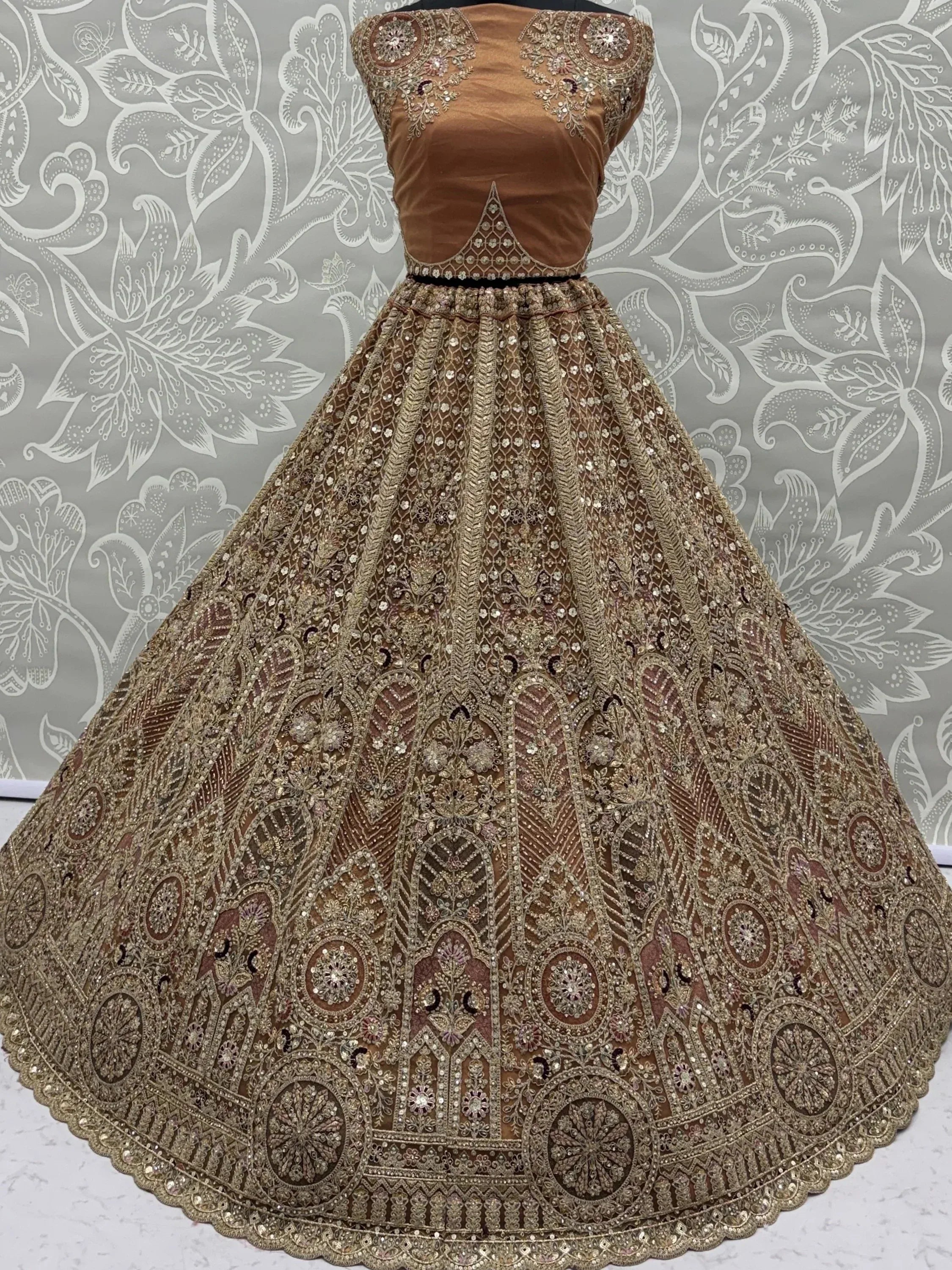 Sparkling Brown Multi Thread Work Net Reception Wear Lehenga Choli
