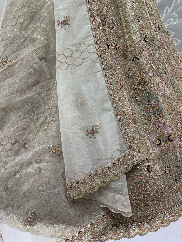 Dreamy Off-White Dori Work Net Wedding Wear Lehenga Choli