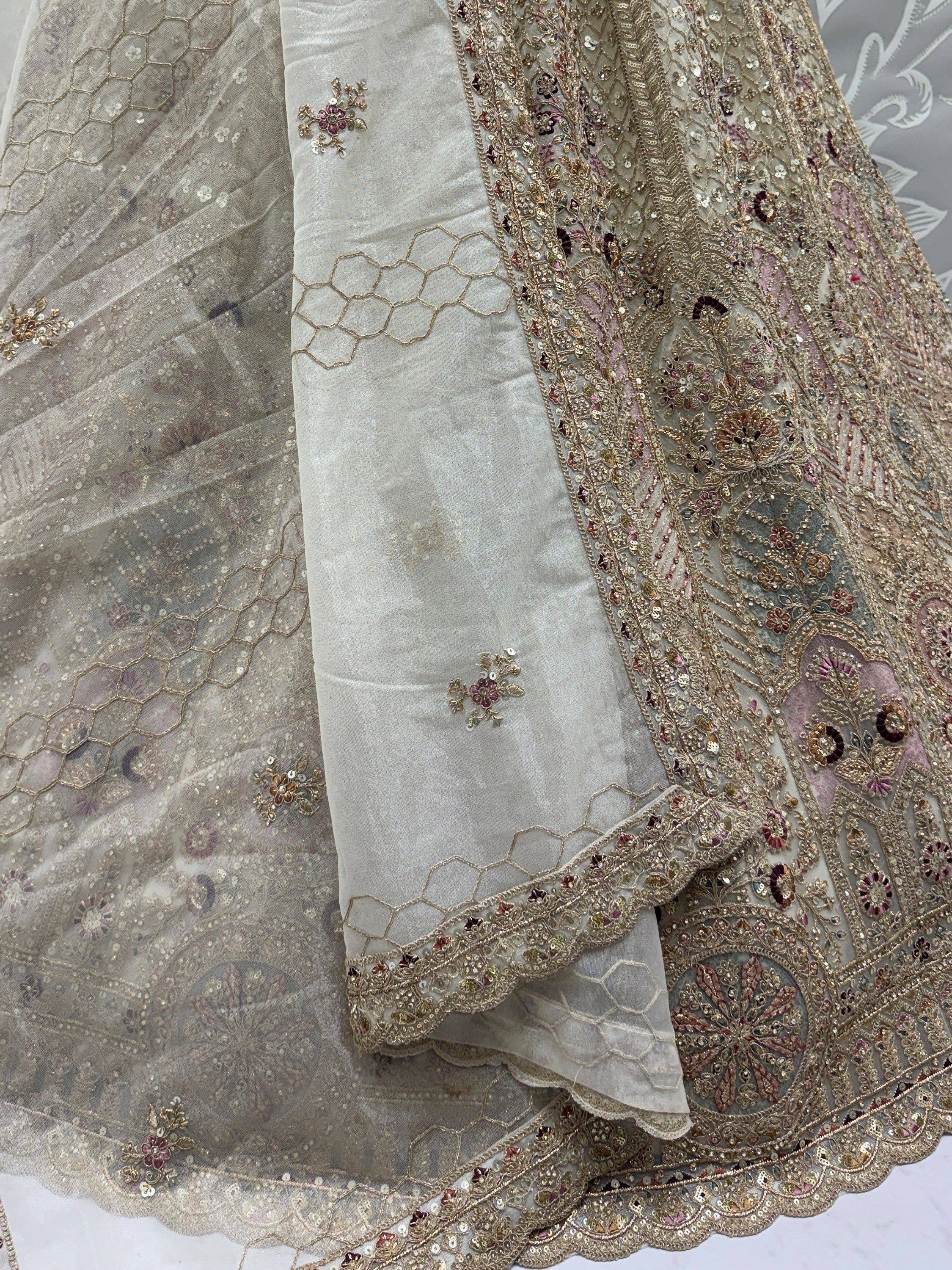 Dreamy Off-White Dori Work Net Wedding Wear Lehenga Choli