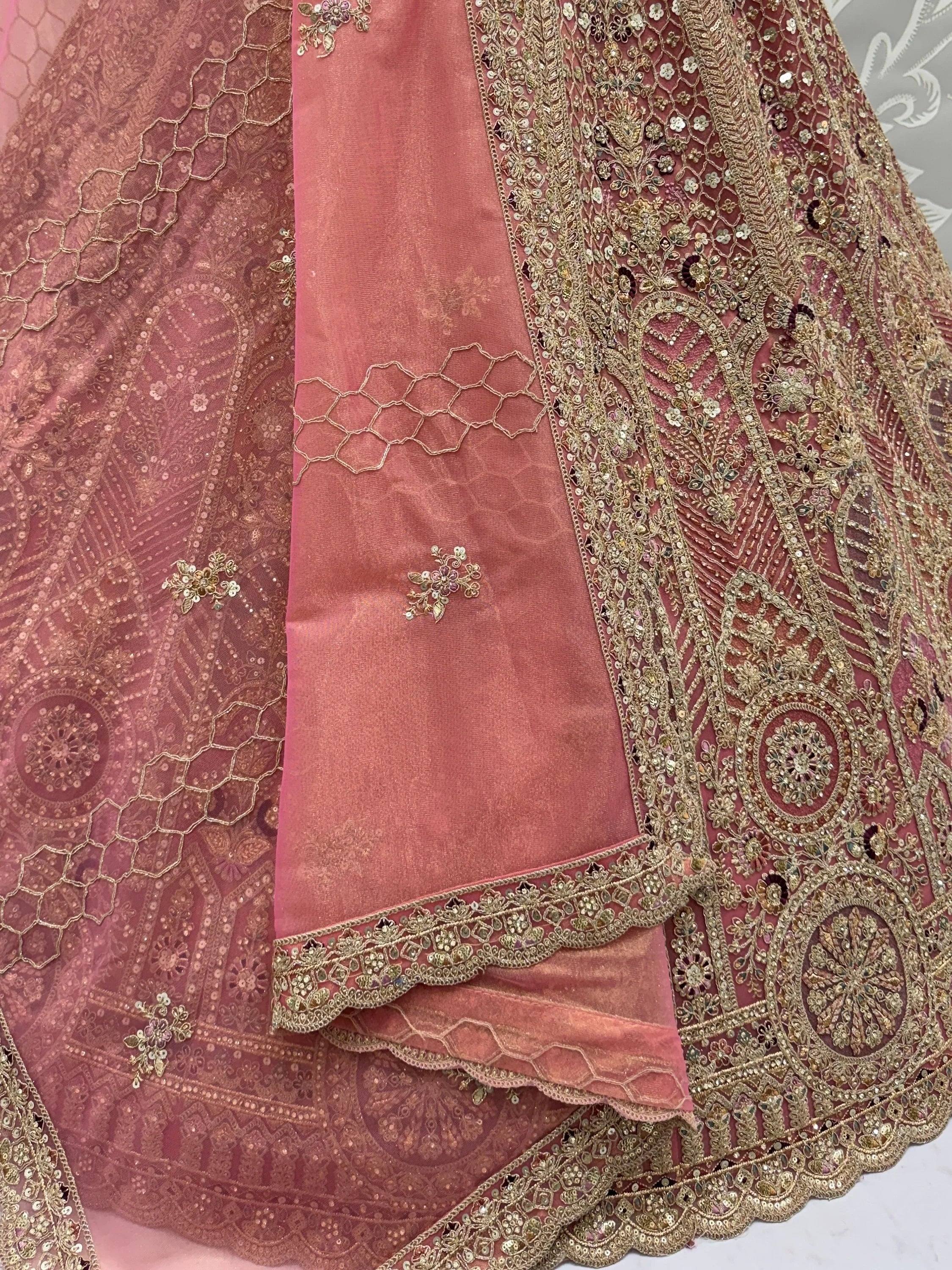 Gorgeous Dusty Pink Zircon Work Net Engagement Wear Lehenga With Blouse