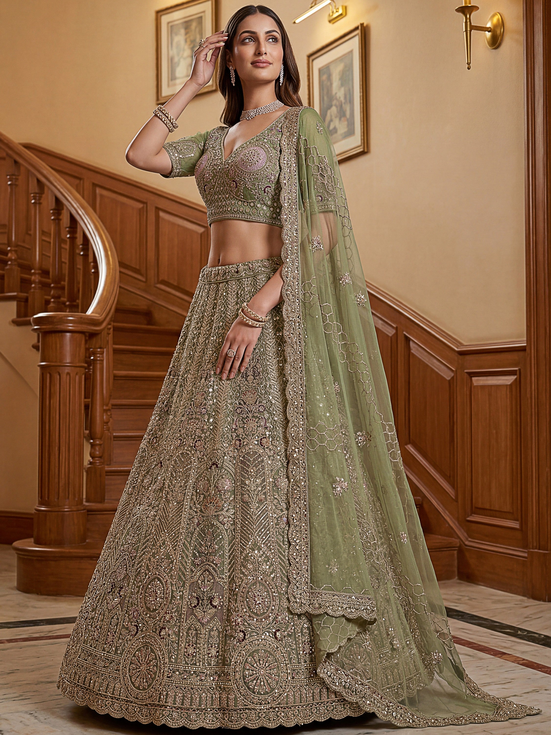 Ravishing Green Heavy Embroidered Net Evening Wear Lehenga Choli