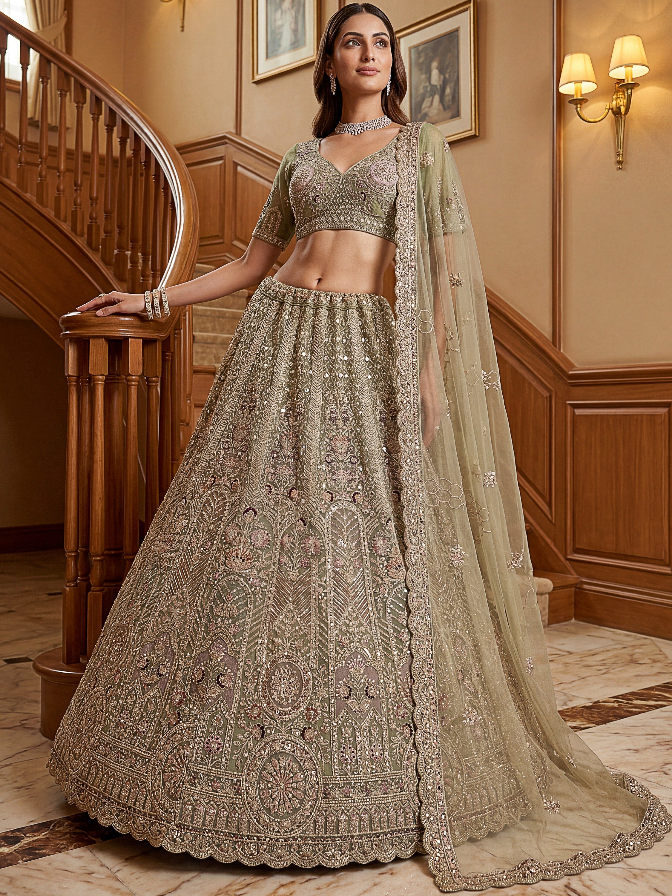 Ravishing Green Heavy Embroidered Net Evening Wear Lehenga Choli