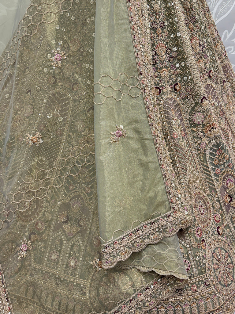 Ravishing Green Heavy Embroidered Net Evening Wear Lehenga Choli