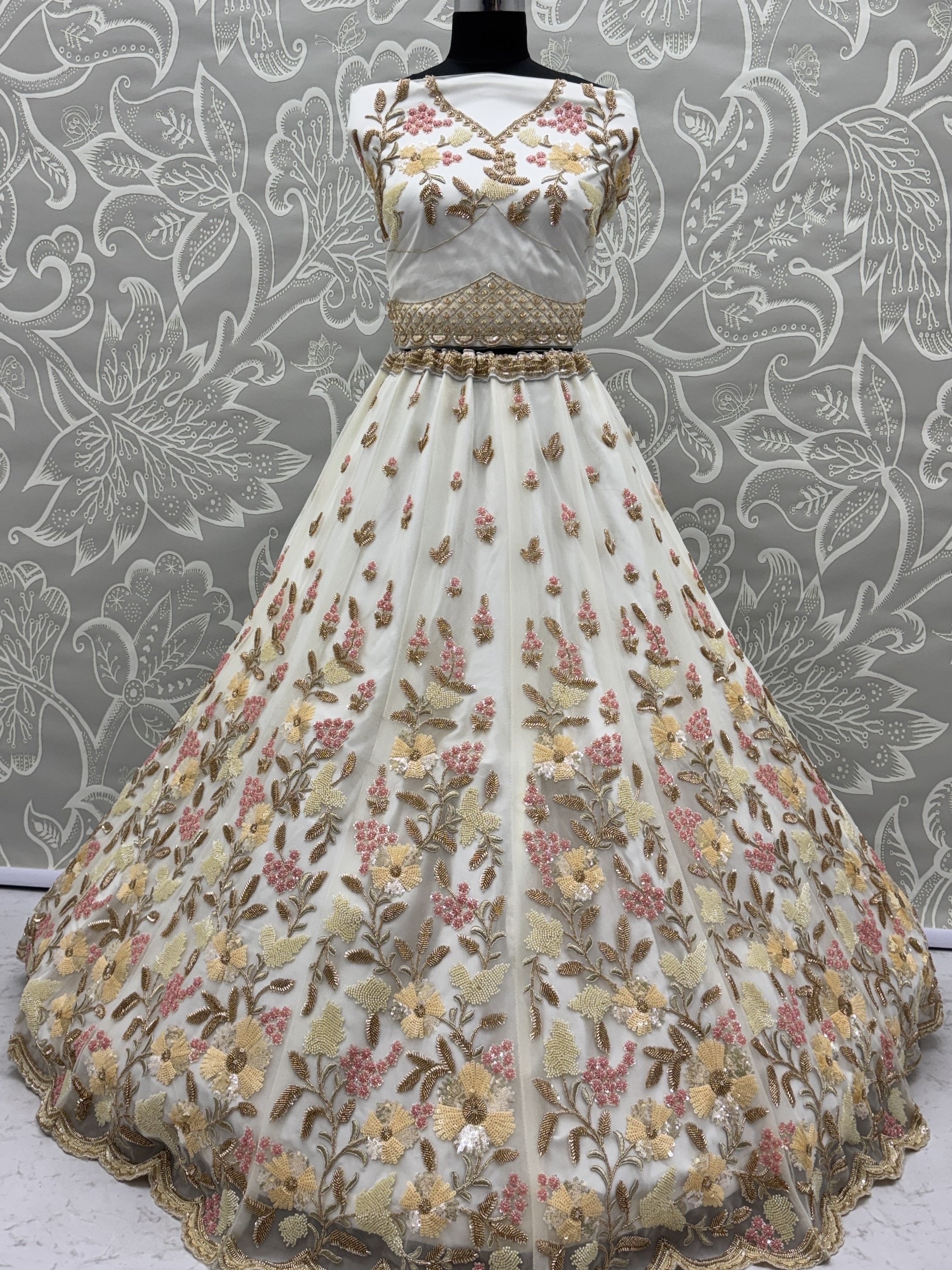 Delightful White Floral Embroidered Net Bridesmaid Lehenga Choli