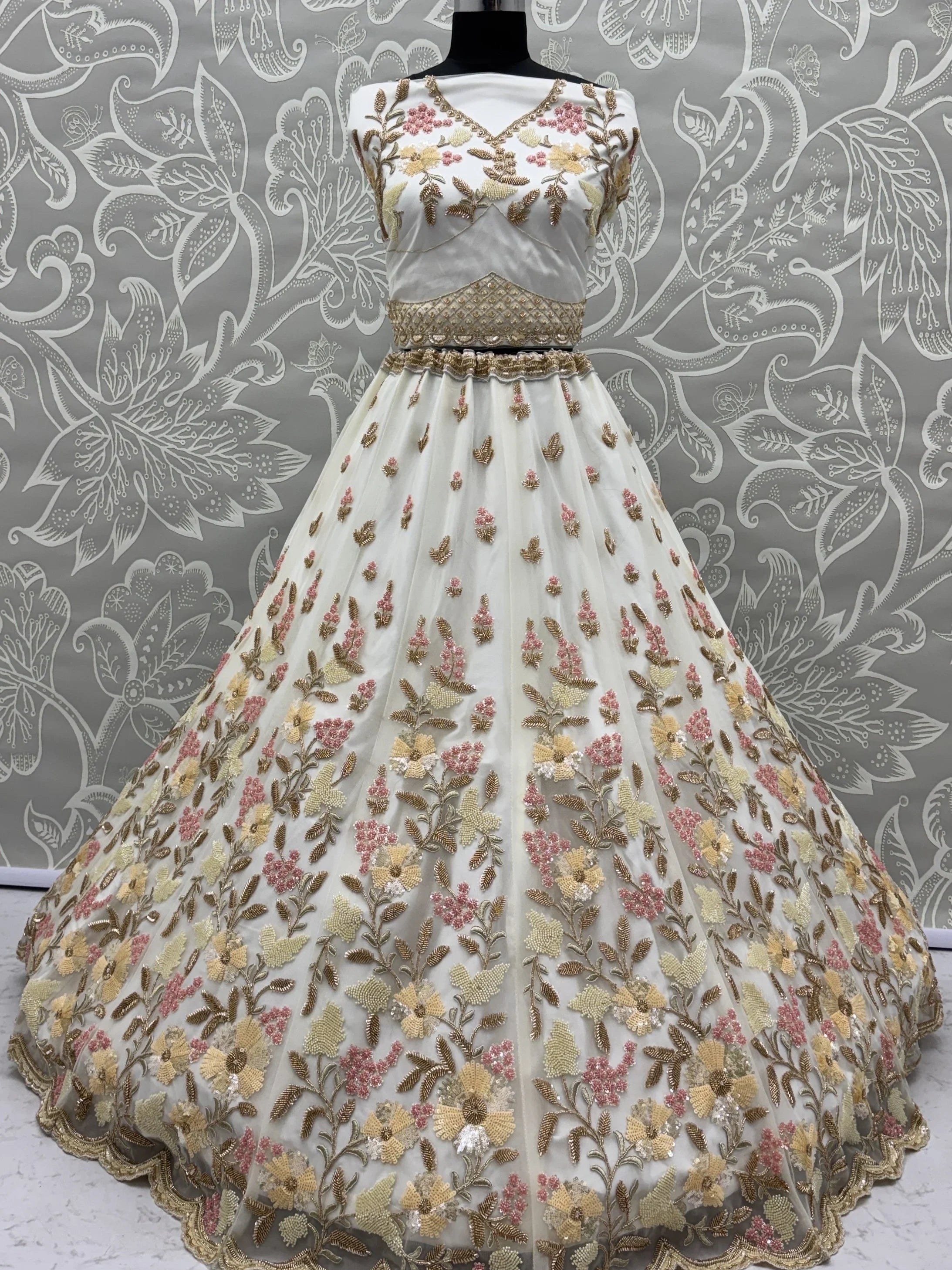 Delightful White Floral Embroidered Net Bridesmaid Lehenga Choli