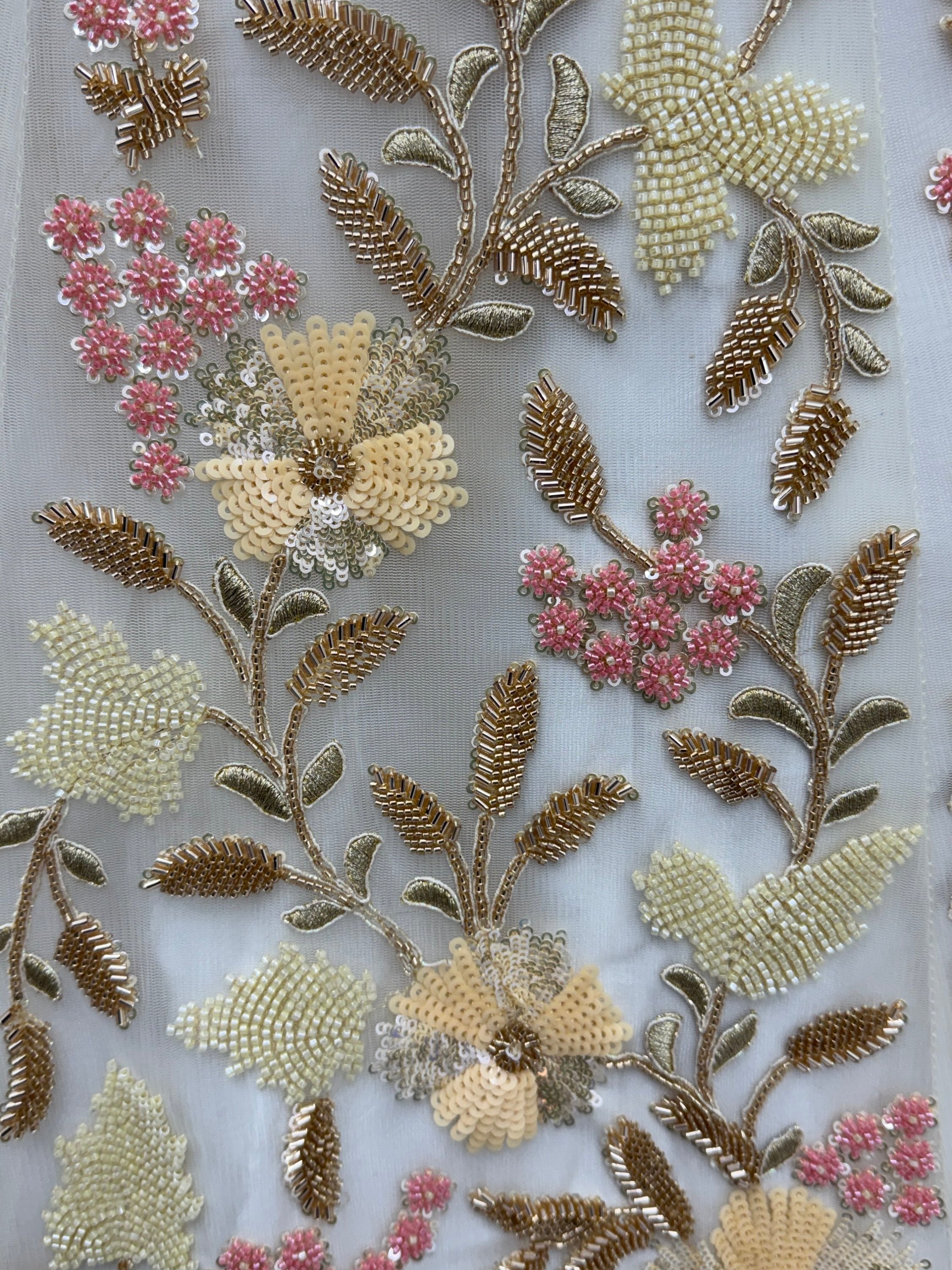 Delightful White Floral Embroidered Net Bridesmaid Lehenga Choli