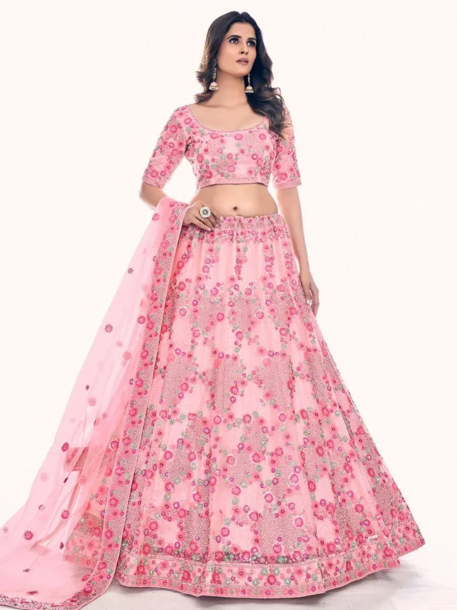 Impressive Pink Embroidered Soft Net Engagement Lehenga Choli